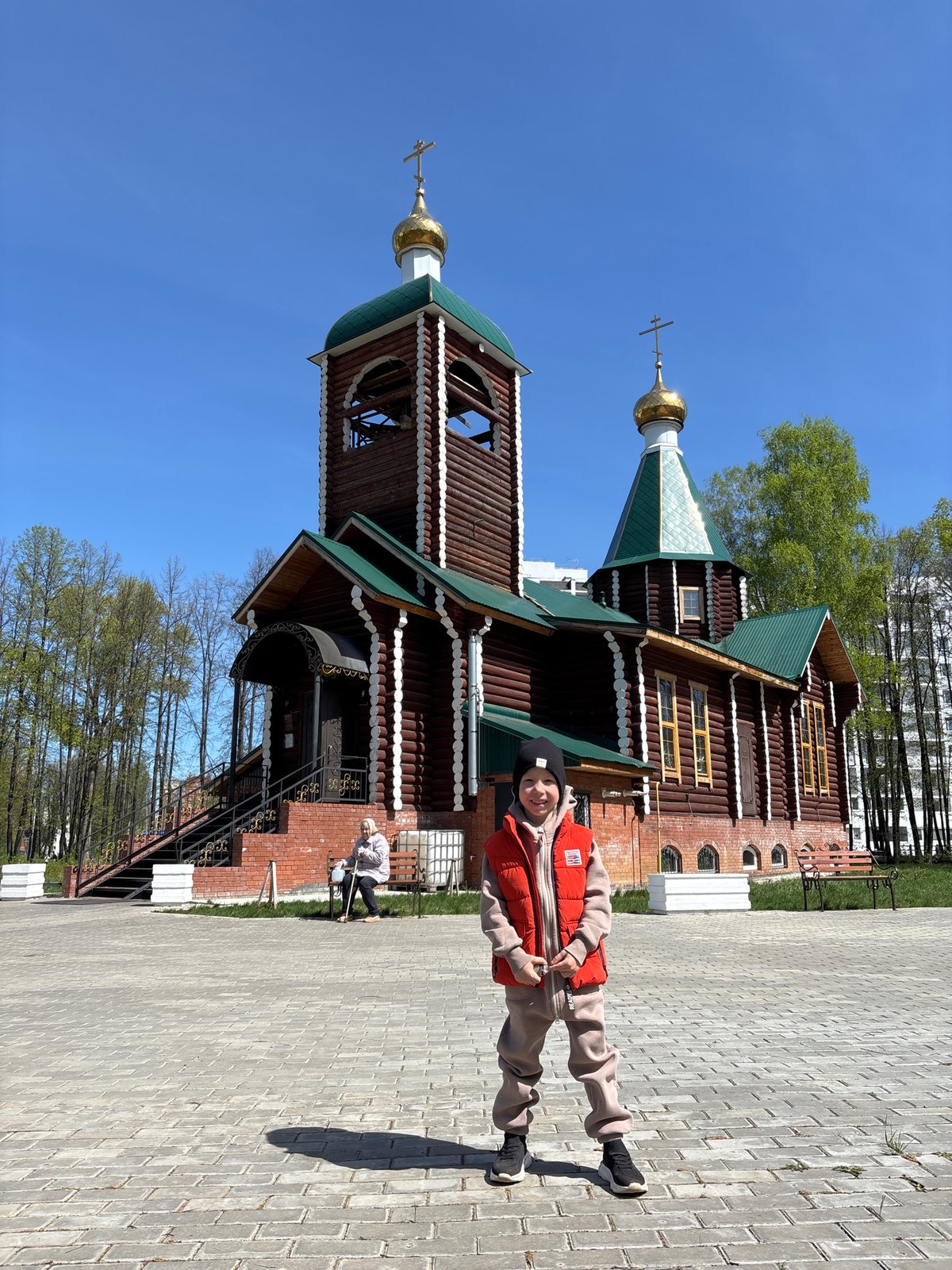 Person photographed at Orthodox church in Chaikovsky, Russia