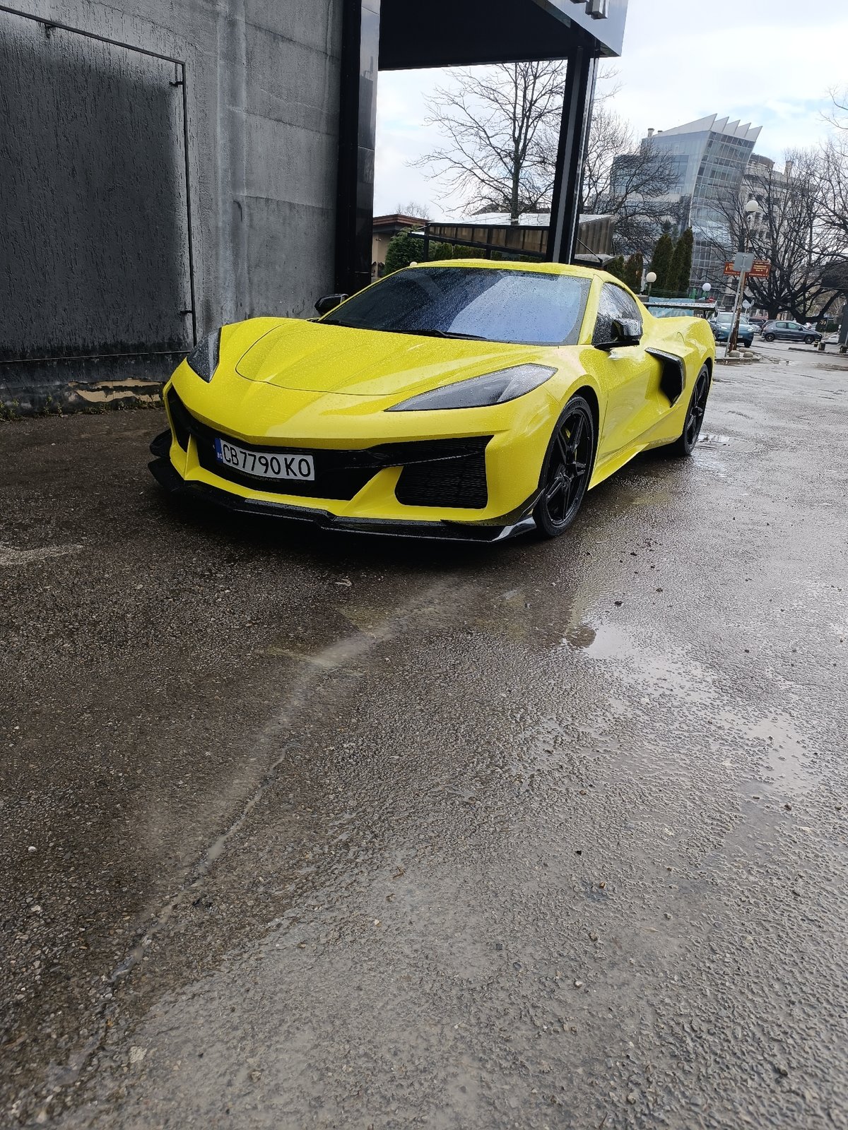 Yellow Corvette spotted on wet Sofia streets after rain