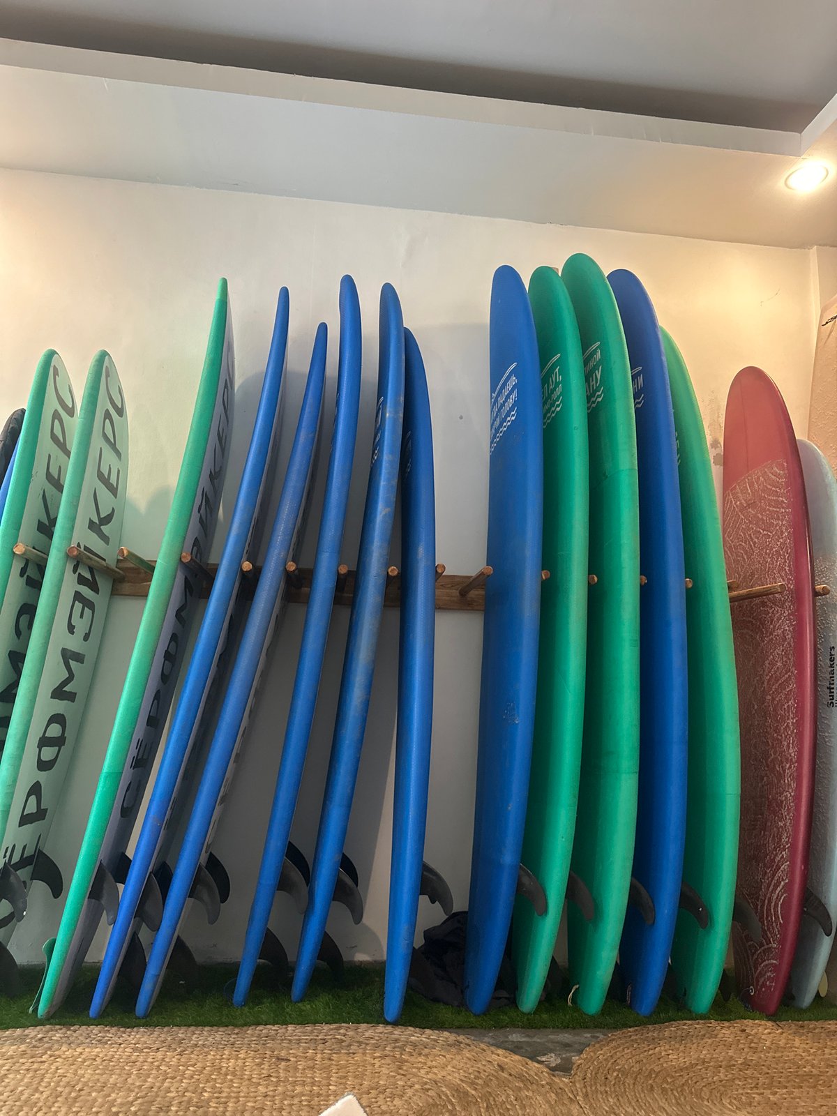 Surfboards stored at indoor facility in Kuta, Indonesia