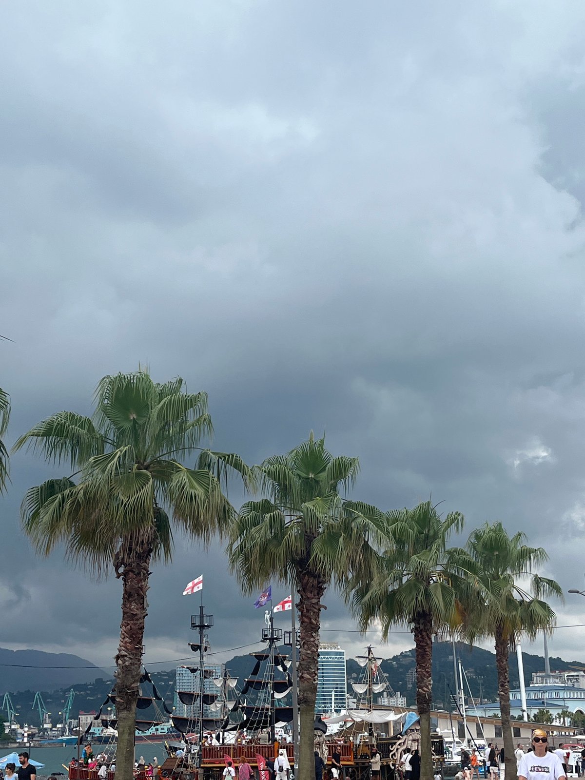 Batumi's waterfront landmarks on a cloudy summer day