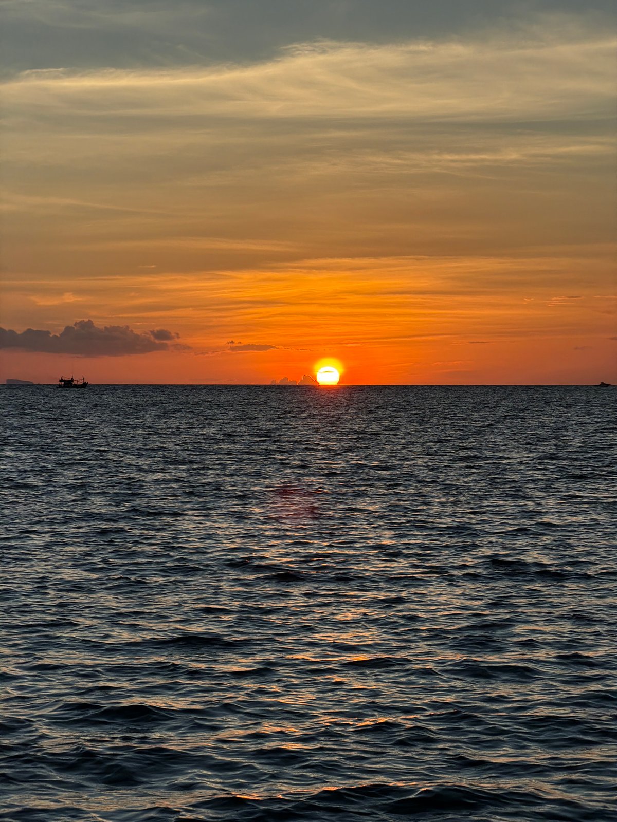 Sunset wading and fishing off the coast of Koh Samui