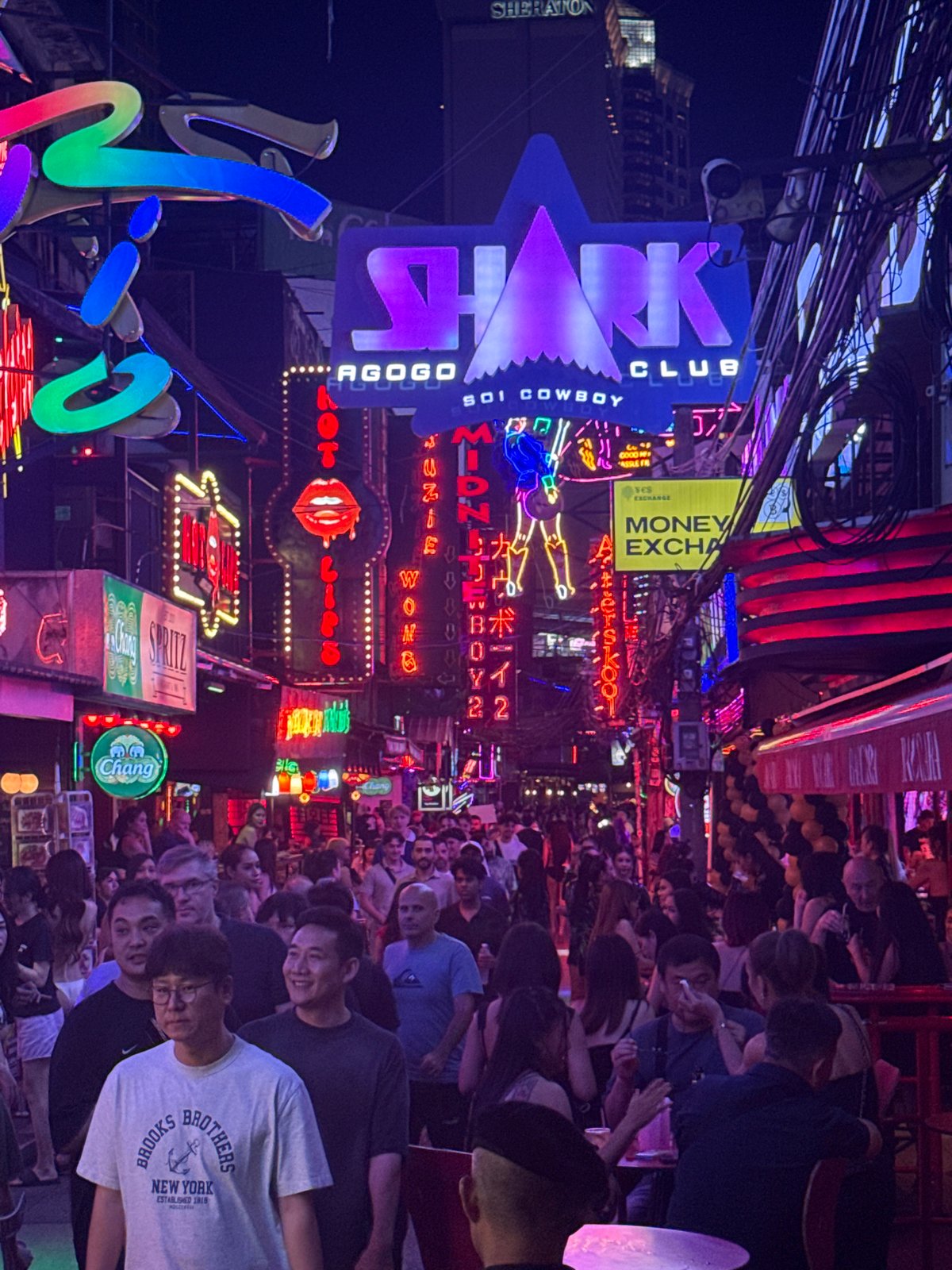 Neon-lit night on Bangkok's Soi Cowboy