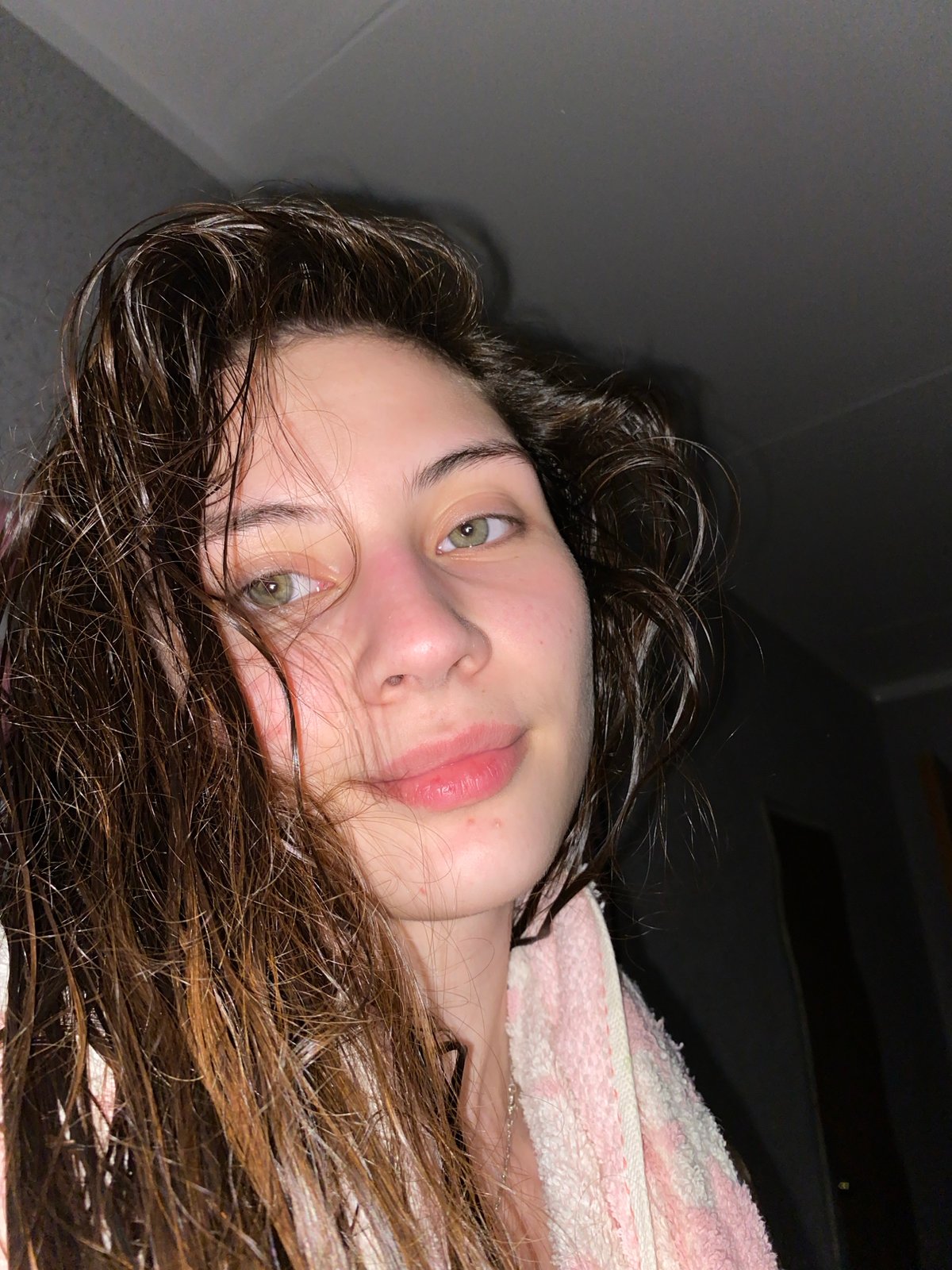 Woman with wet hair photographed in casual moments, Votkinsk