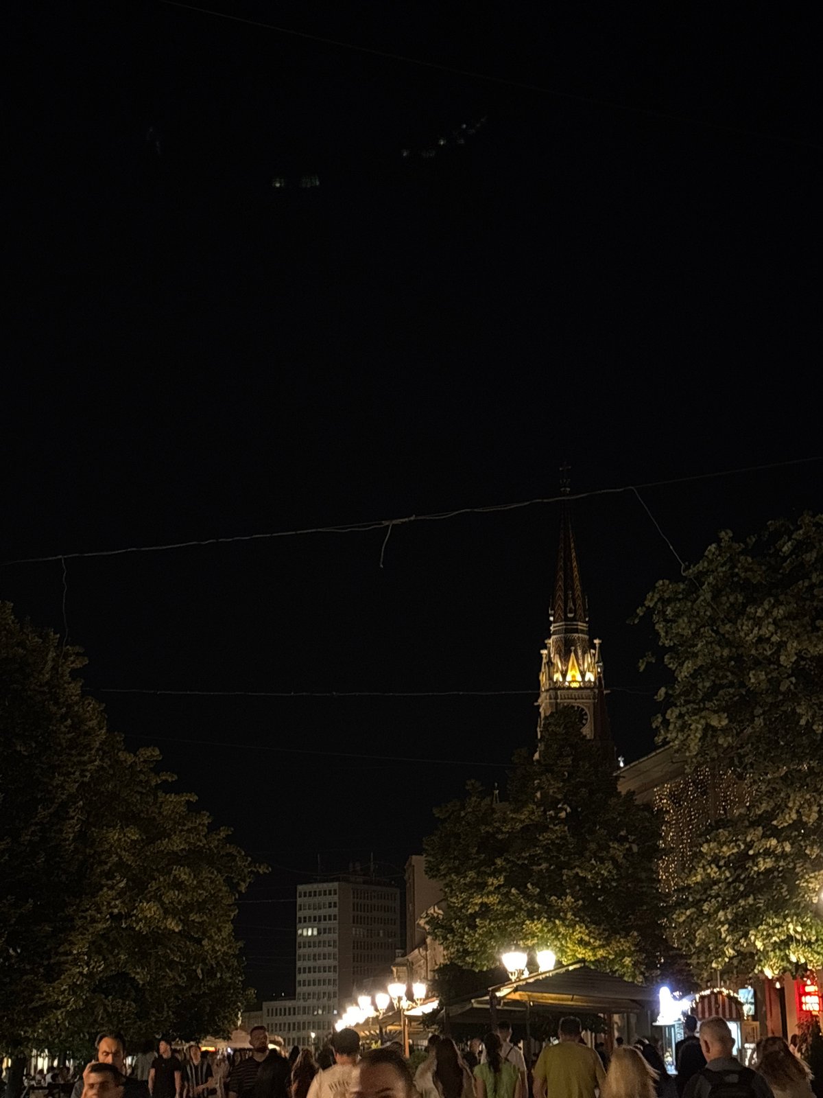 Evening stroll captures illuminated landmarks in downtown Novi Sad