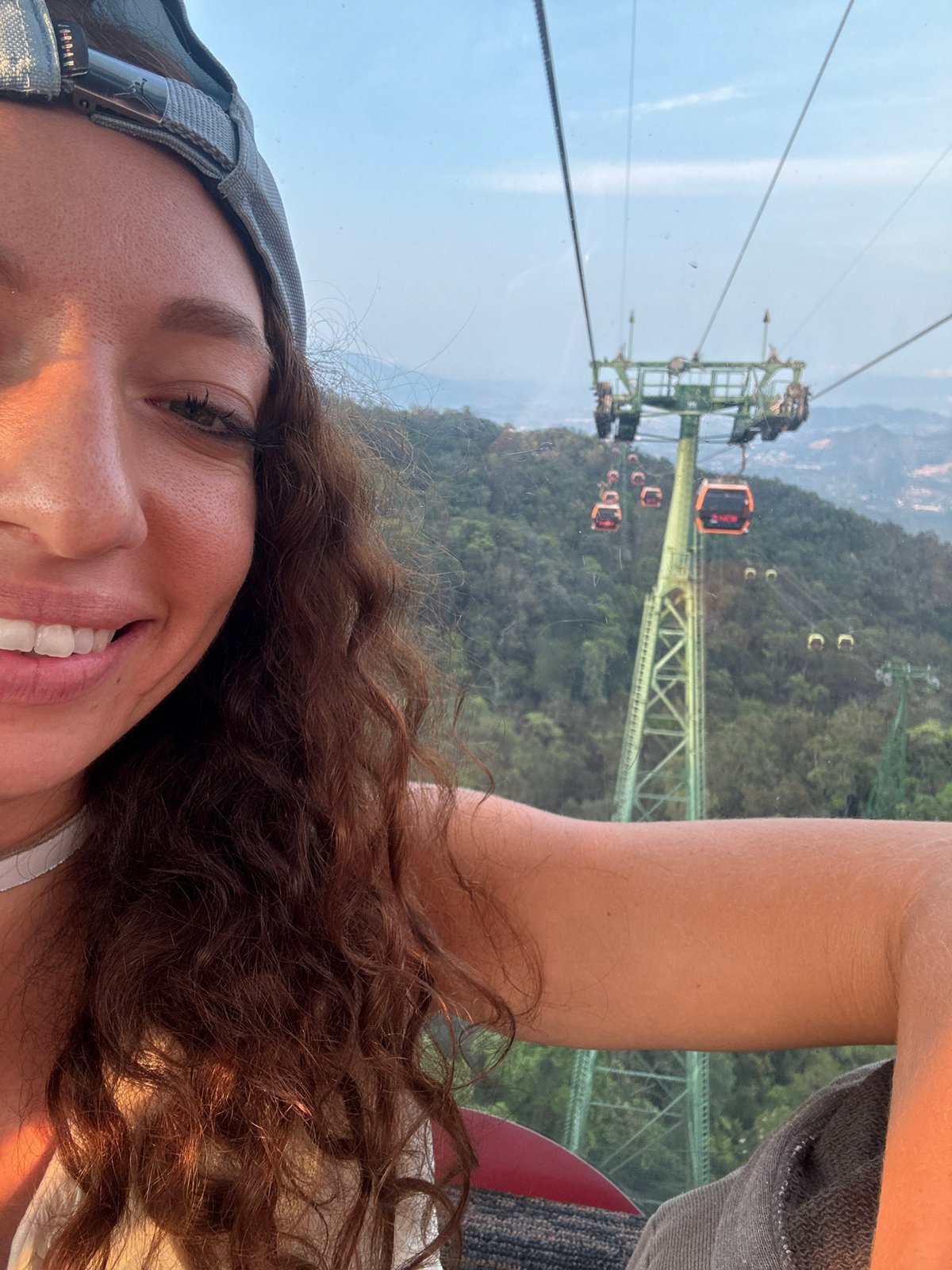 Woman rides cable car at Bà Nà Hills, Vietnam