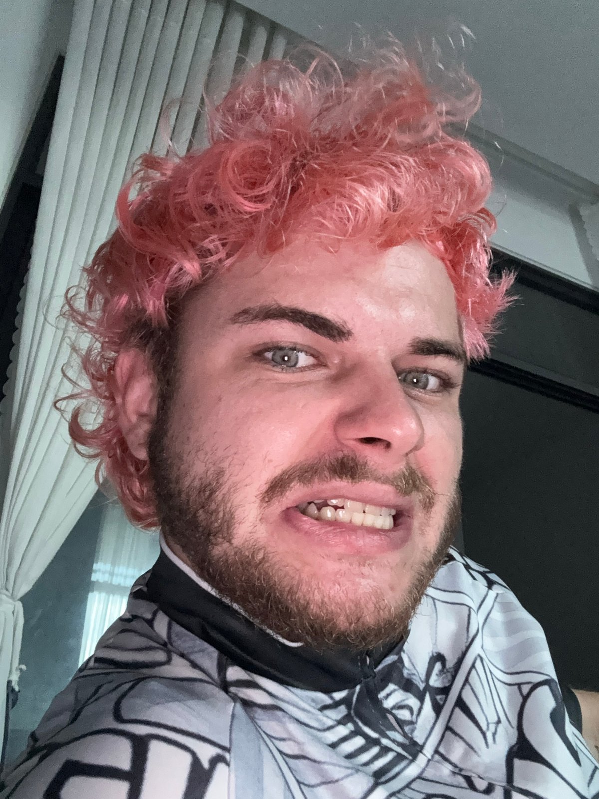 Pink-haired person takes selfie session in Đà Nẵng apartment