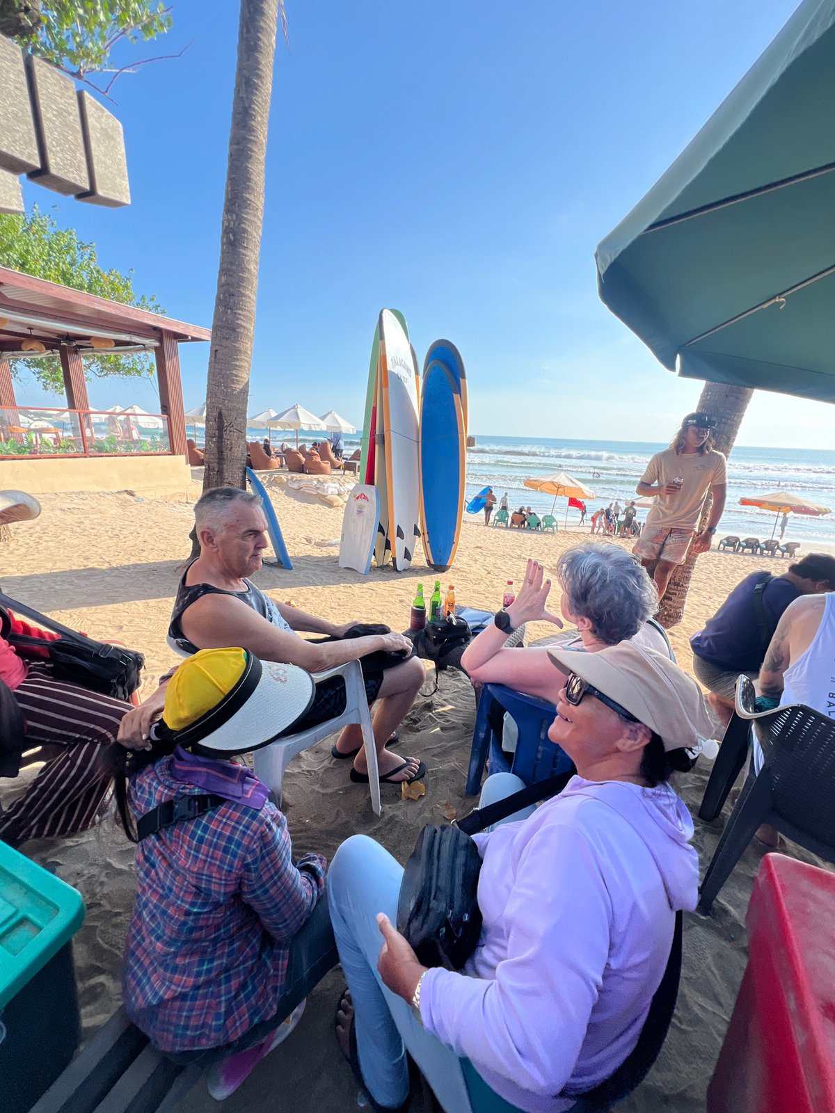 Lazy morning drinks and surfboards at Kuta Beach