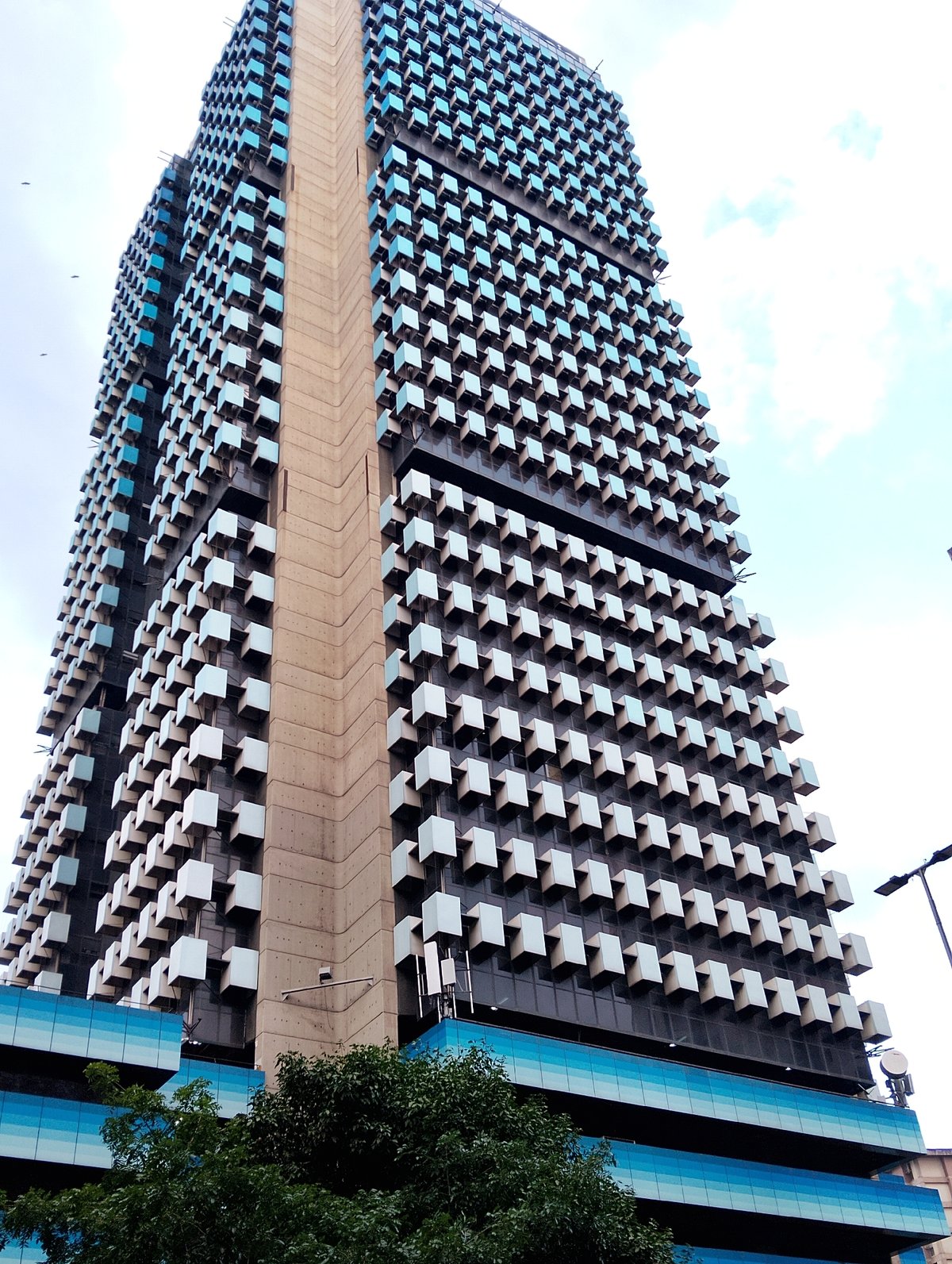 Urban scenes captured: building, retail display, mall interior