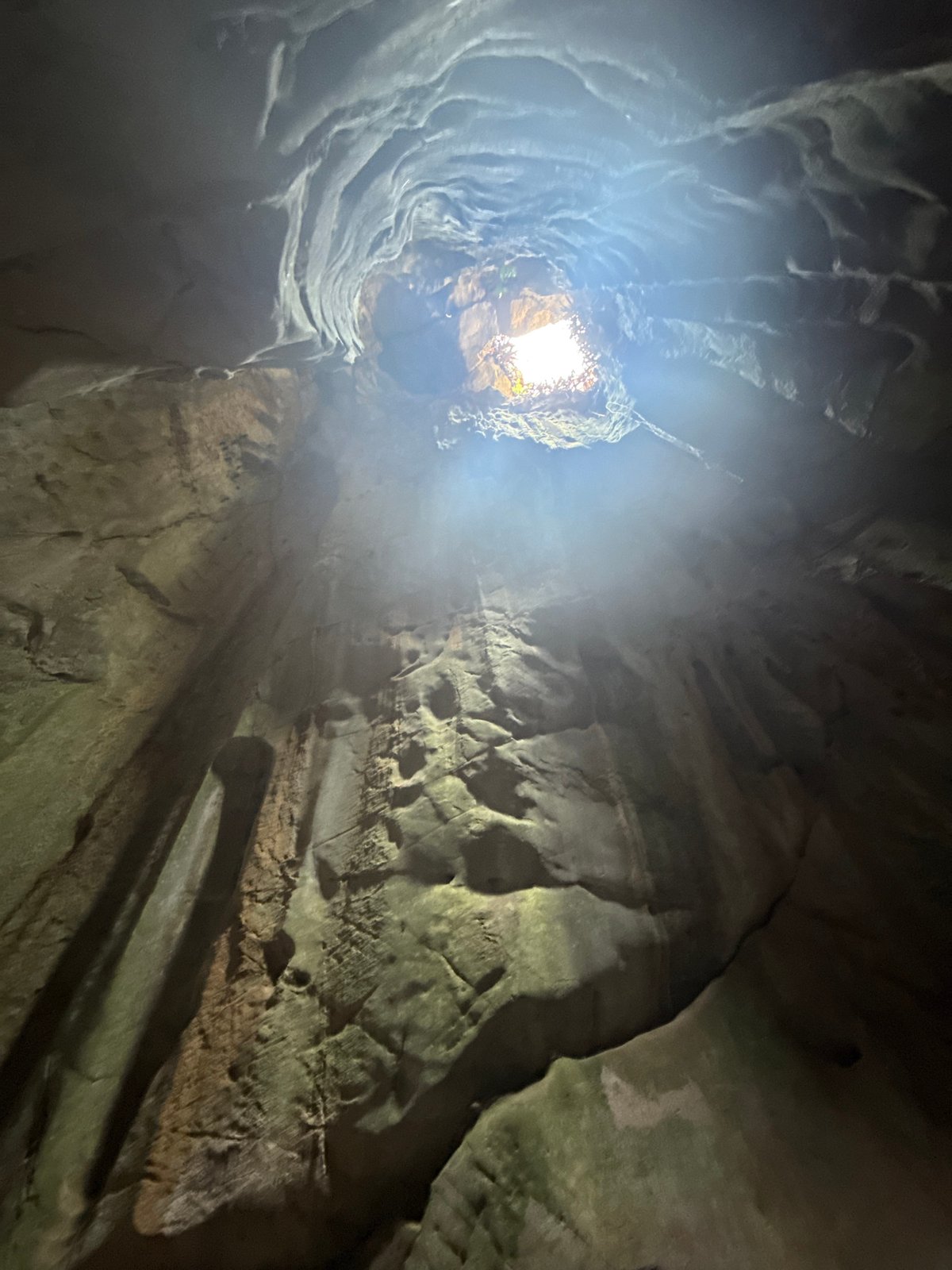 Cave opening photographed from below in Đà Nẵng