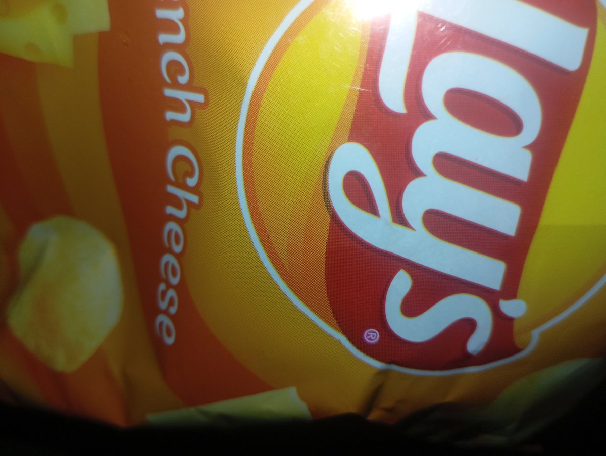 Close-up inventory of household snacks and personal care products