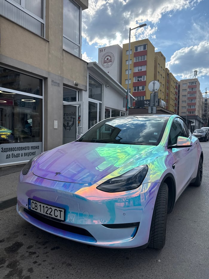 Spring day glimpses across Sofia include wrapped Tesla, blooms, gym