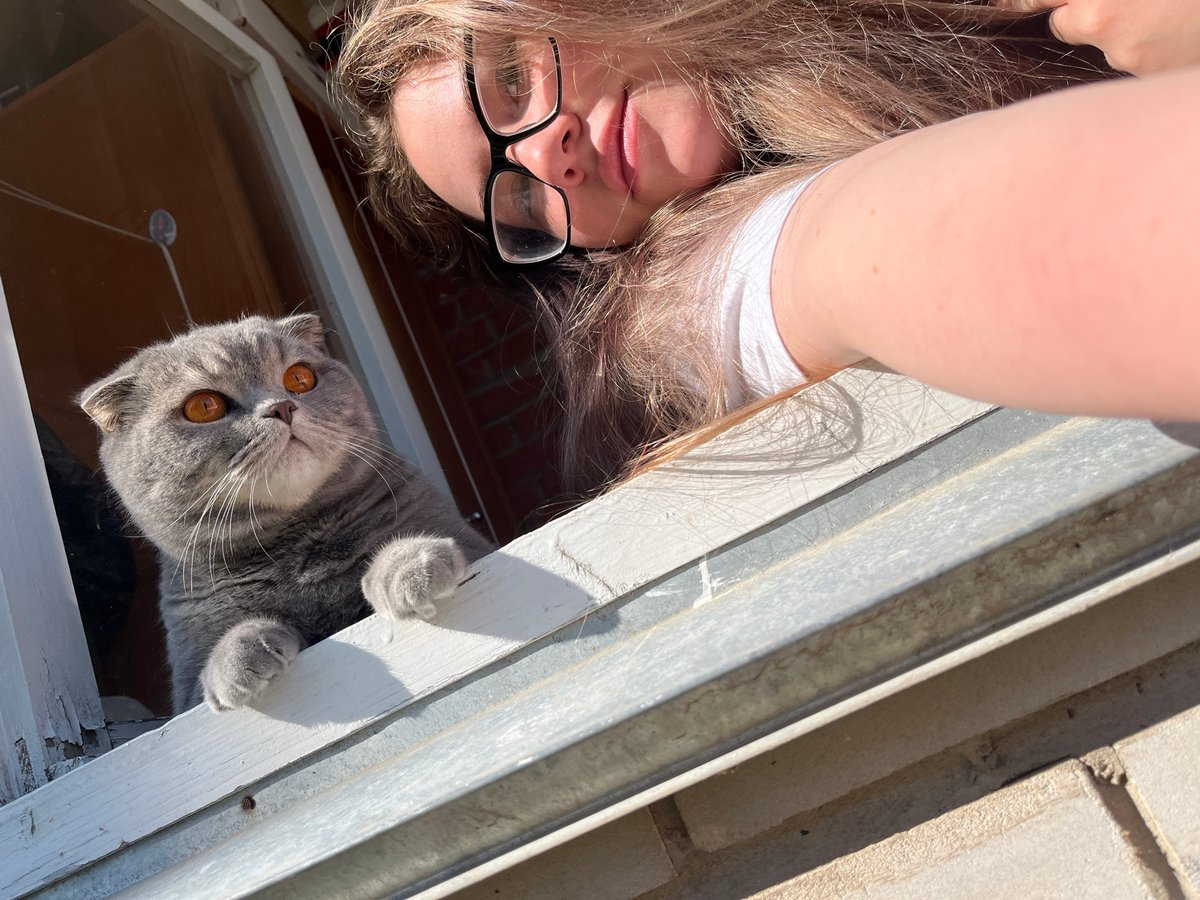 Woman documents morning selfies with cat in Chaikovsky, Russia