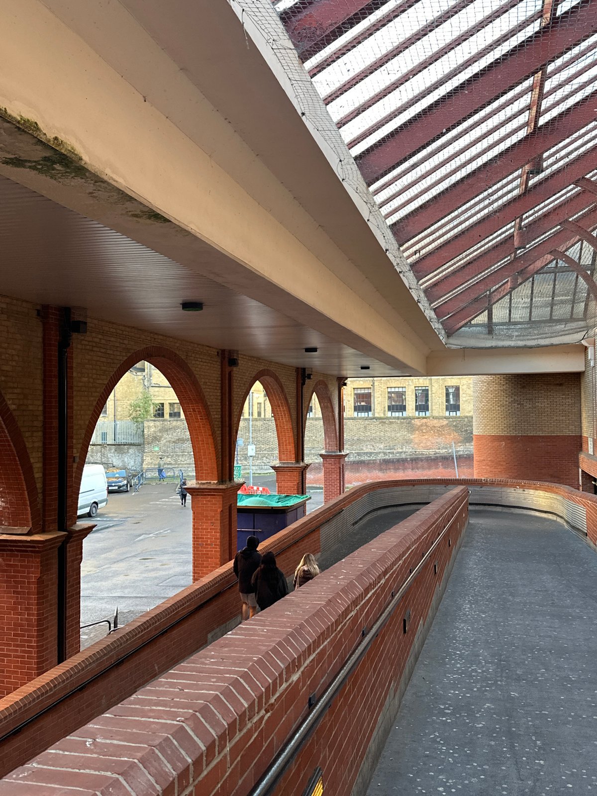 London shopping center walkway observed during evening hours
