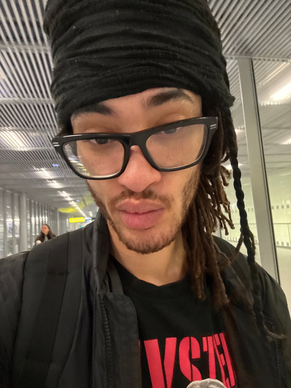 Late-night airport transit documented at Paris-Orly Terminal