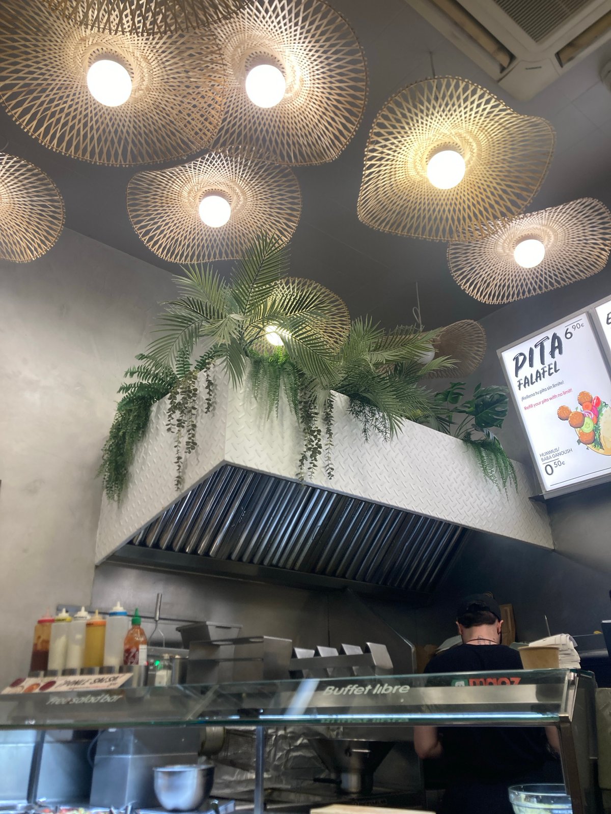 Falafel joint in Barcelona, fries in hand