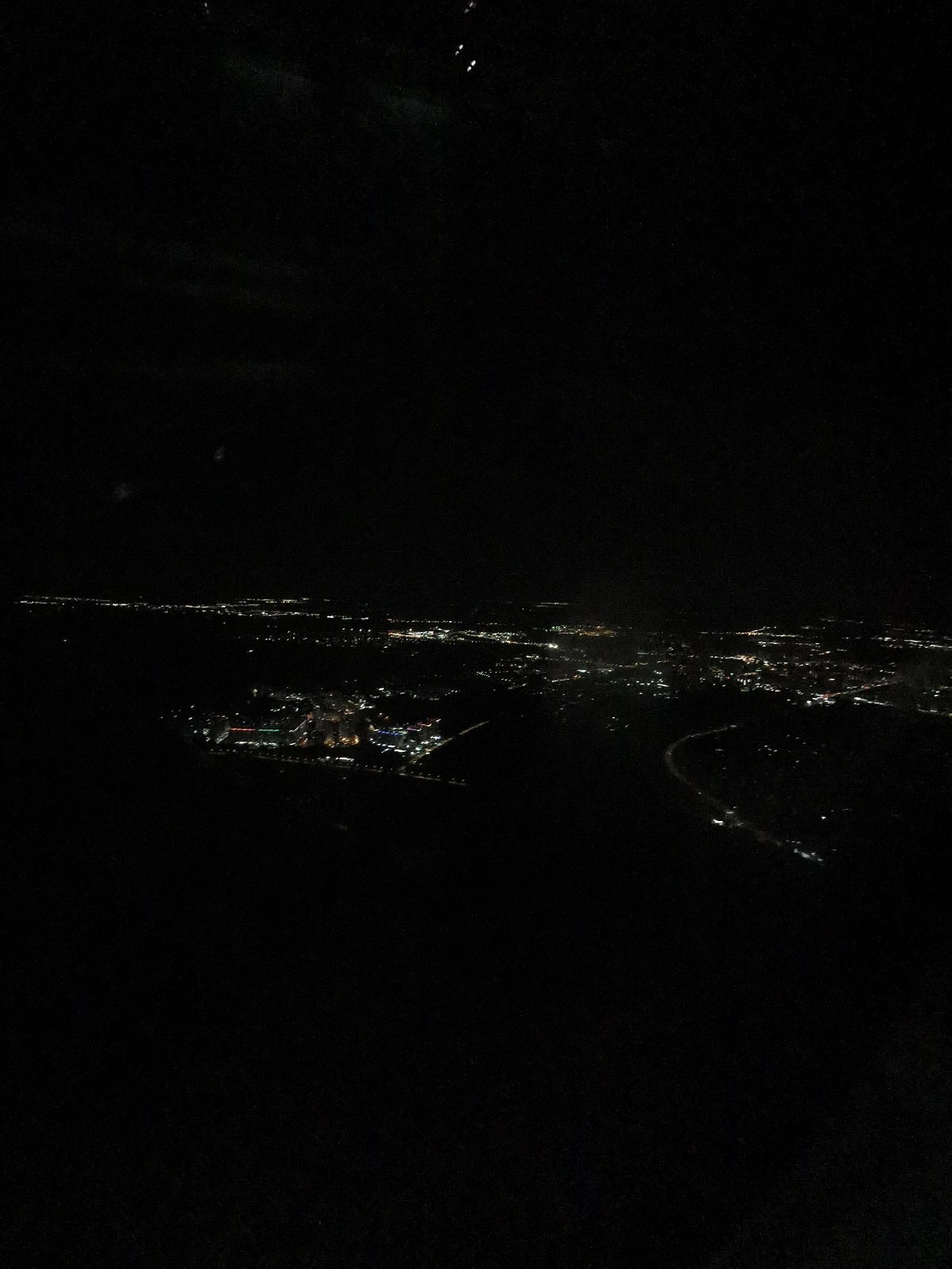 Nighttime aerial views captured over Khimki during aircraft flight