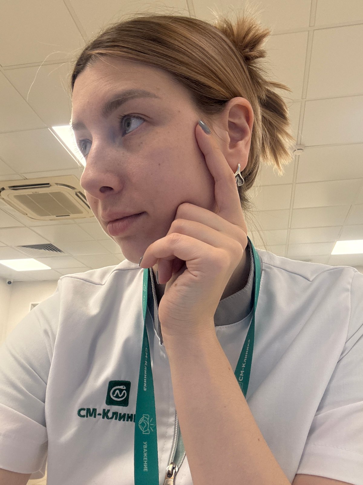 Healthcare worker documented during routine medical facility operations