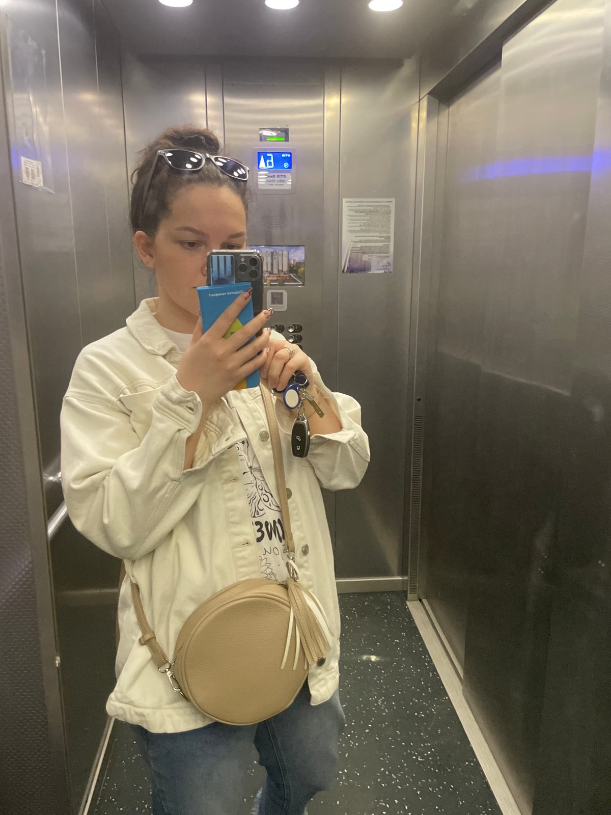 Woman takes elevator selfie in Izhevsk, Russia