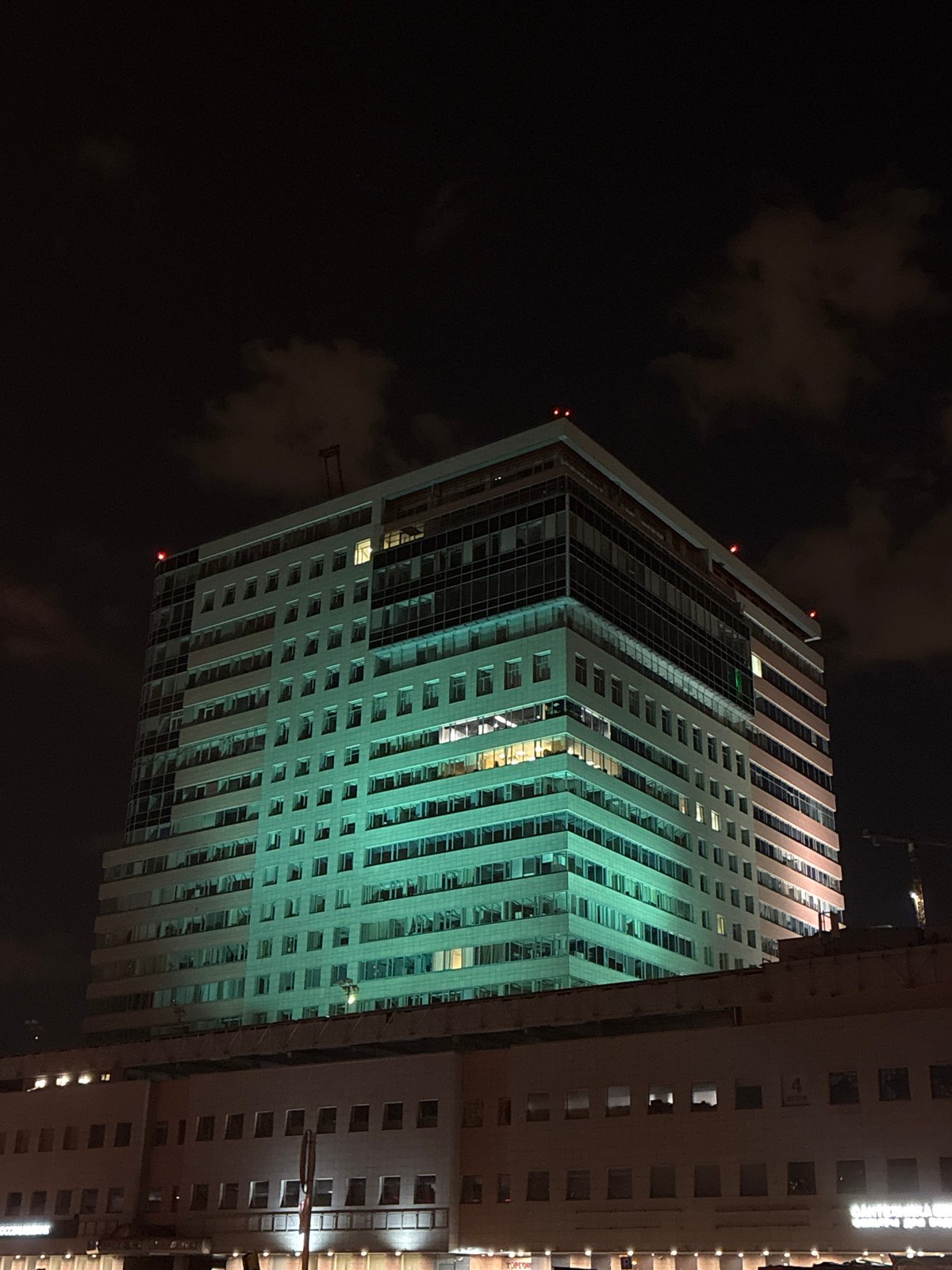 Moscow high-rise buildings illuminated during nighttime hours