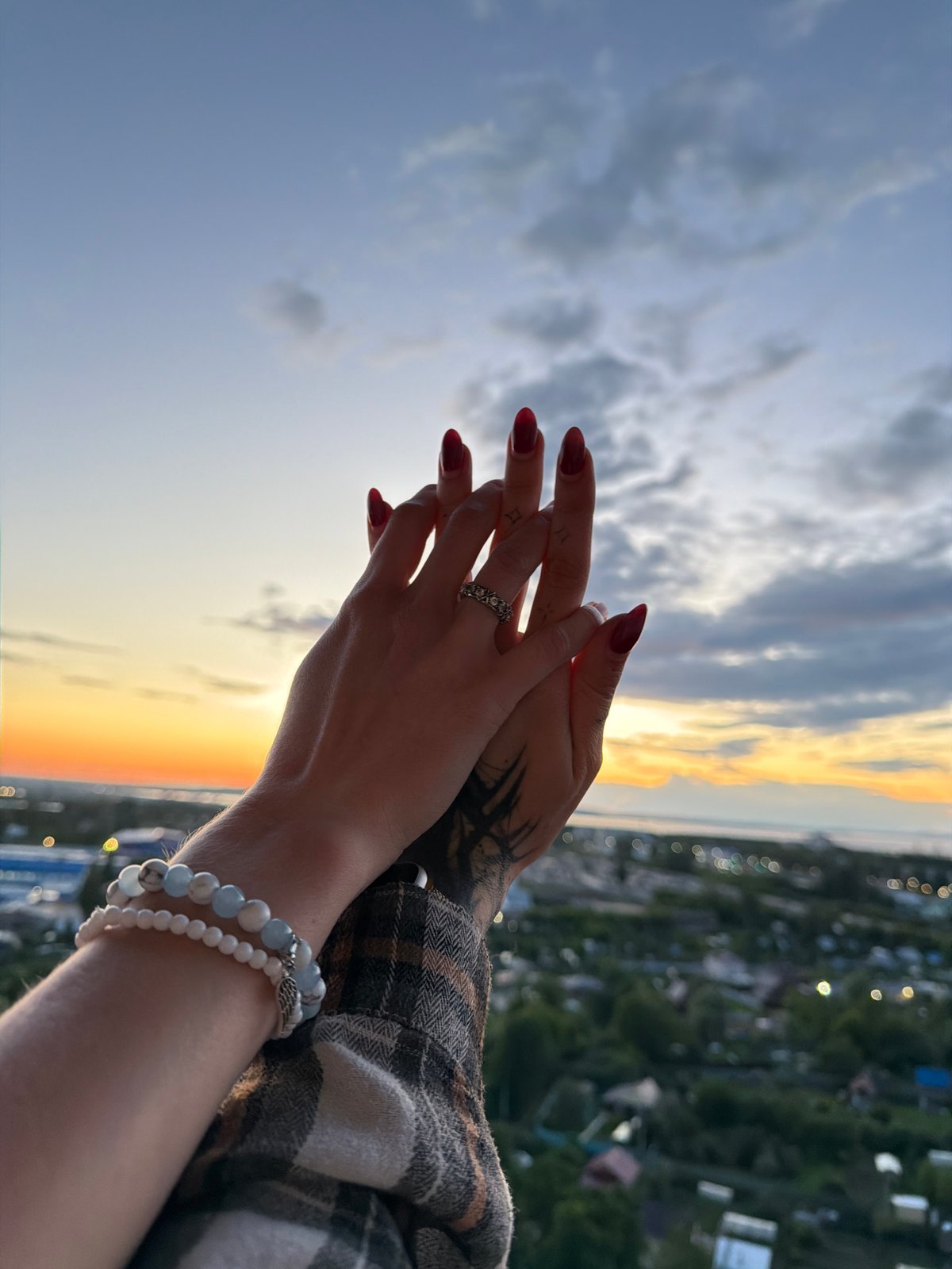 Golden hour rooftop vibes with city views and cold beers