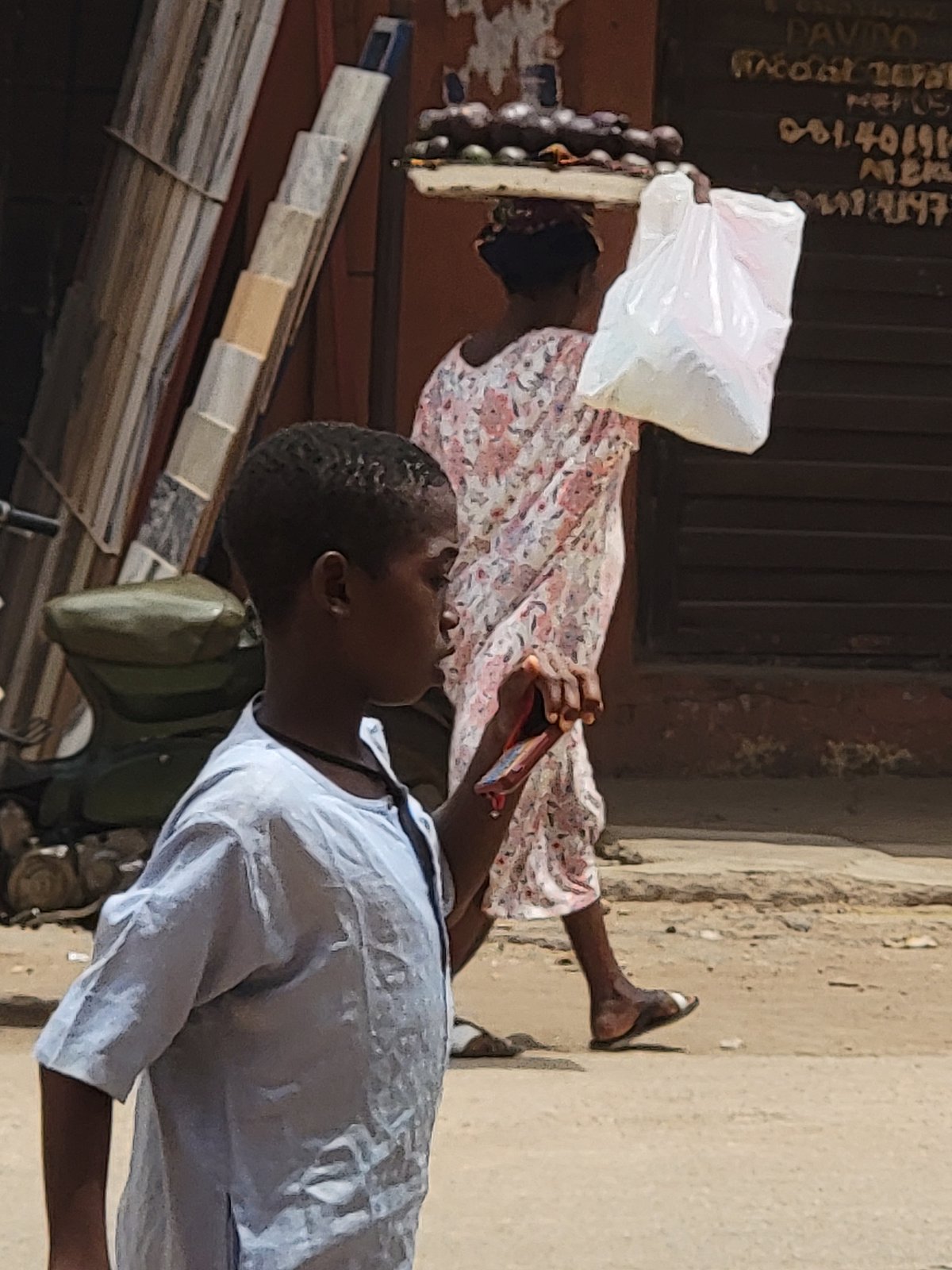 Daily life unfolds on sunny Maiburiji streets and markets