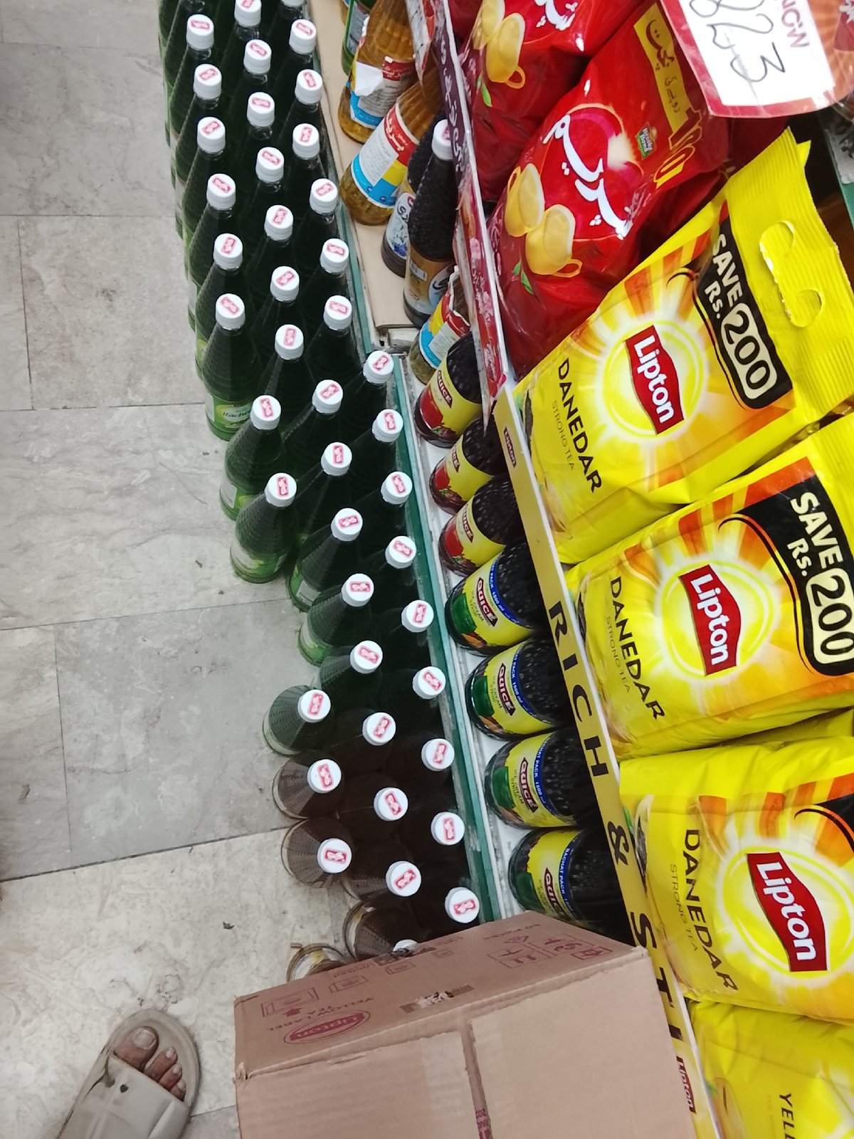 Routine shopping trip documented through Gulgasht Colony, Pakistan stores