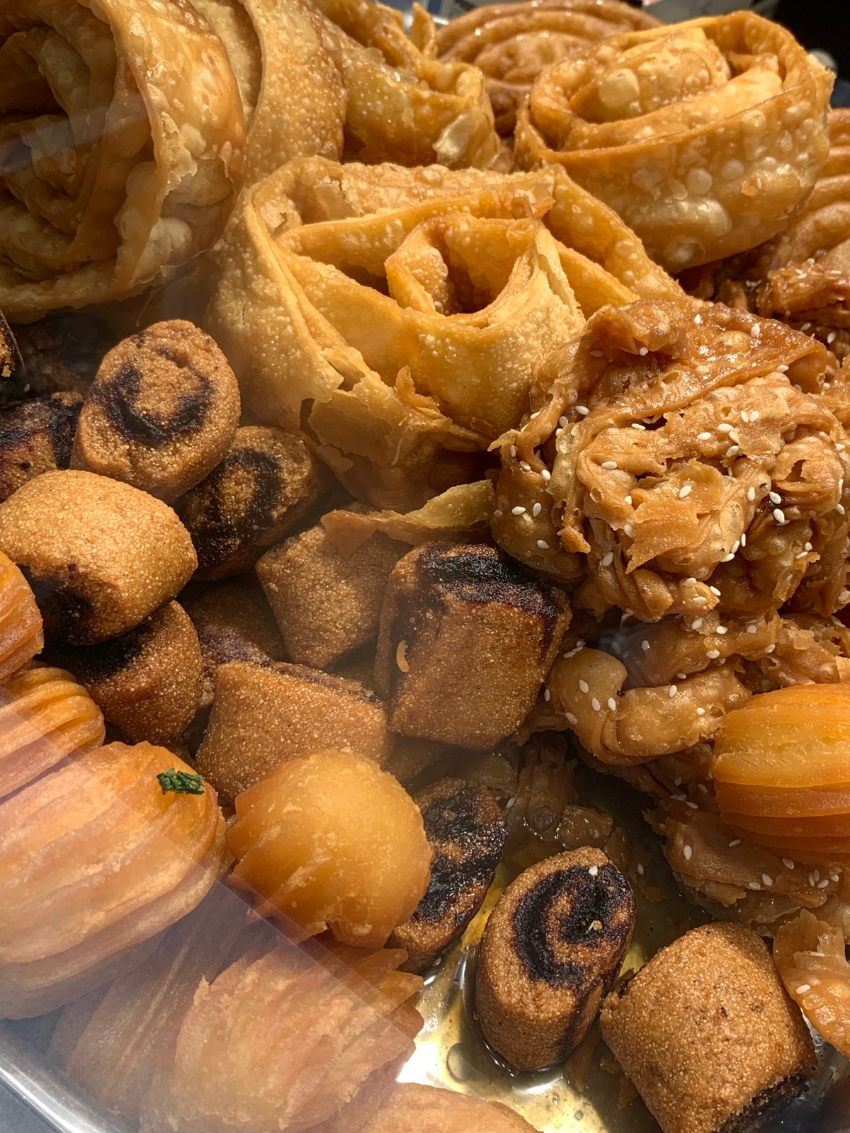 Late-night arcade and pastry shop visit documented in Tel Aviv