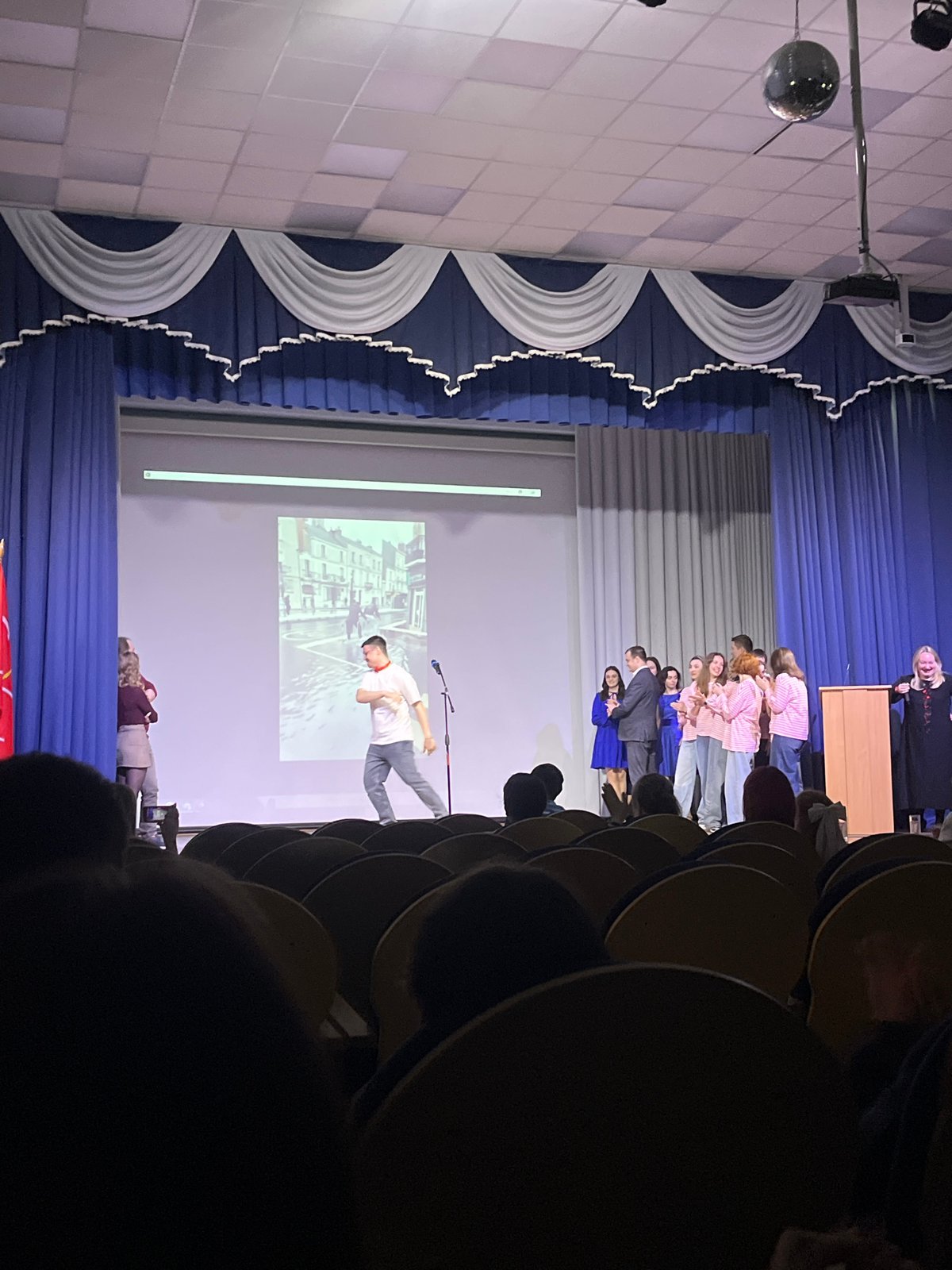 Presentation ceremony held at Vsevolozhsk auditorium with speakers and slideshow