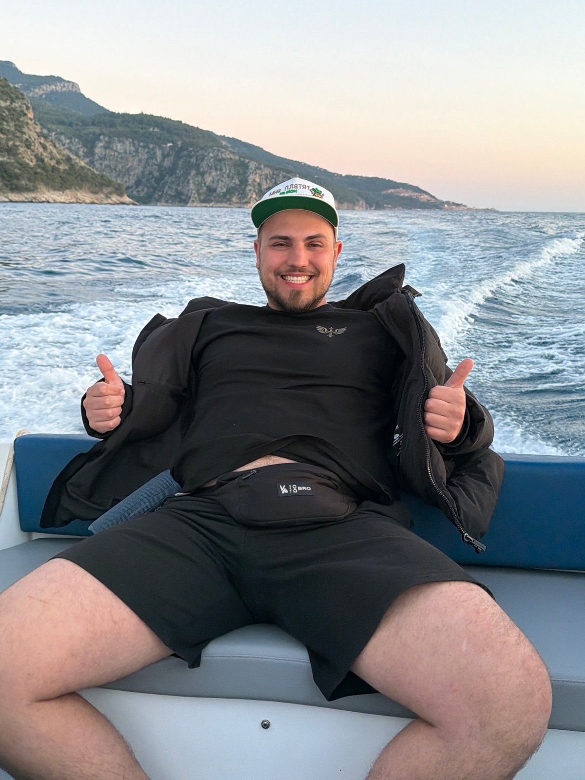 Boat excursion documented off Turkish coast during sunset hours
