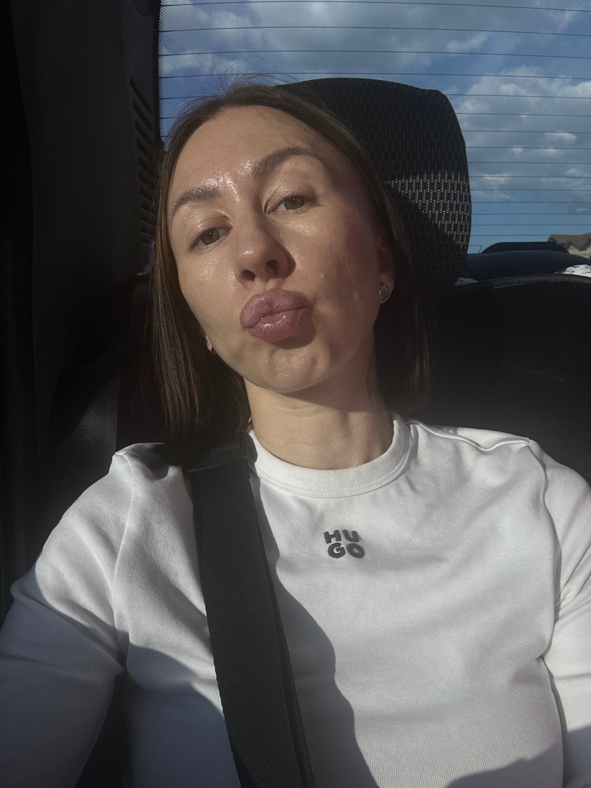 Woman takes car selfie in Болгуры, Russia