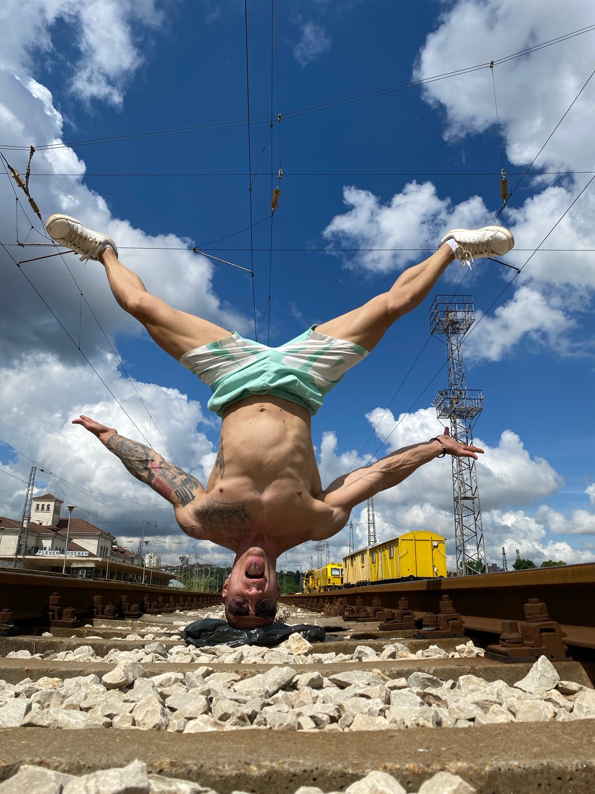 Man performs handstands on railway tracks at Pleven station