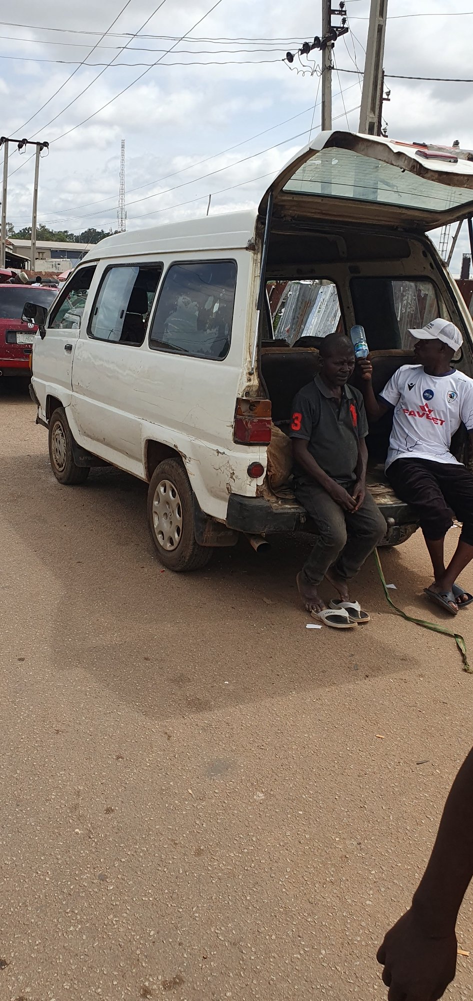 Everyday street life and transport in Bukuru, Nigeria