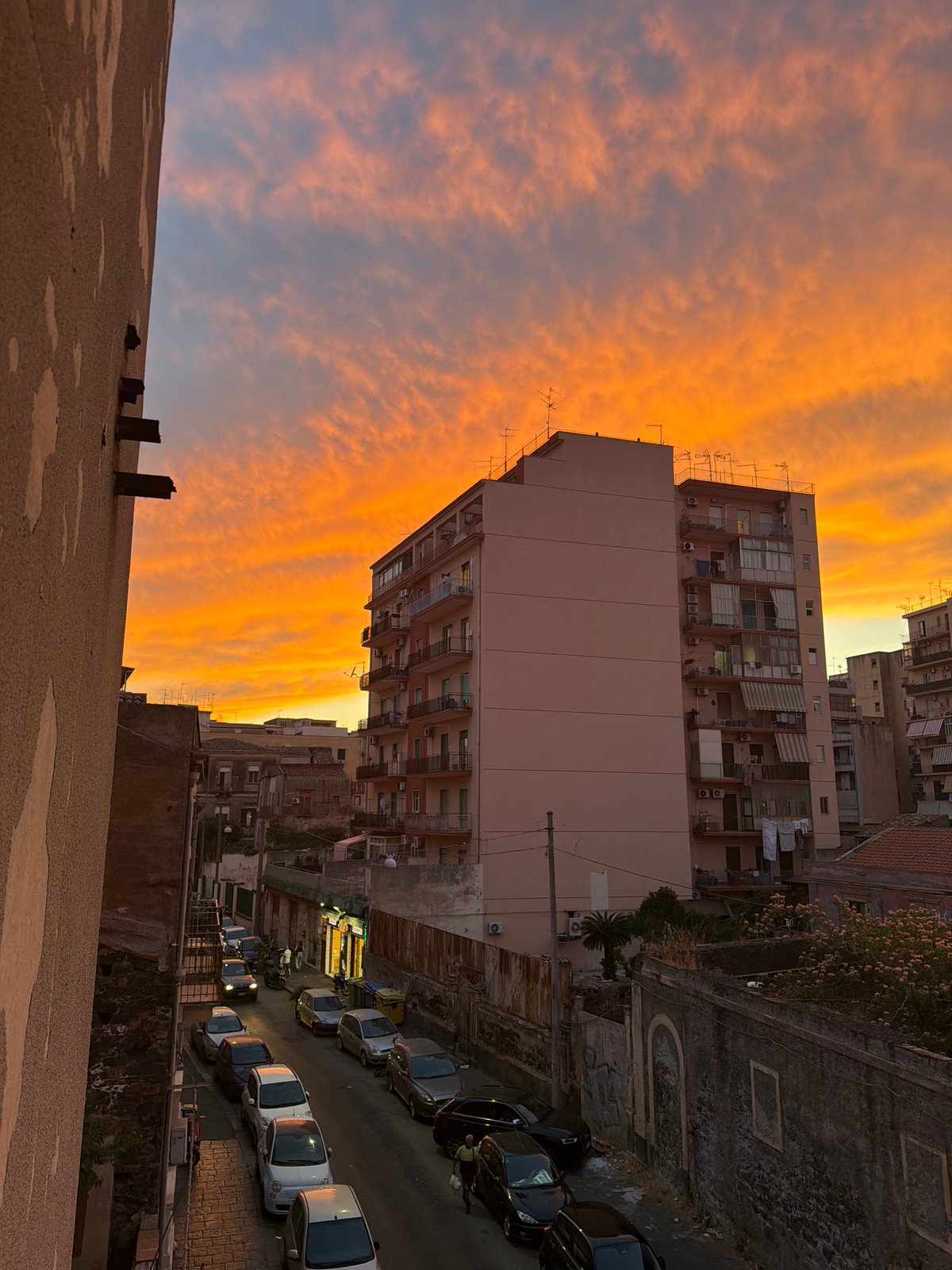 Spectacular sunset illuminates Catania with fireworks, volcanic backdrop