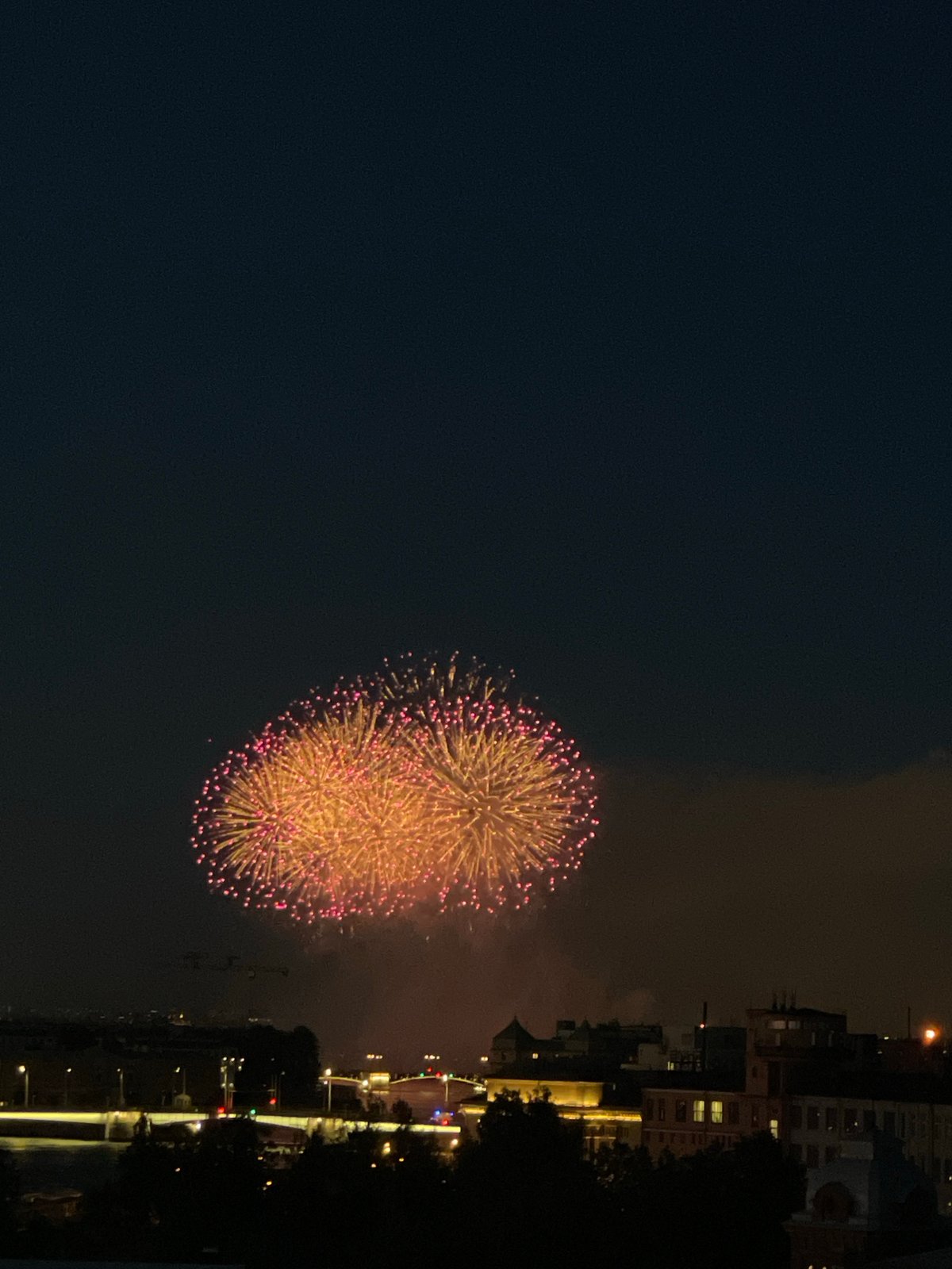 Fireworks light up a Russian city skyline on a June night