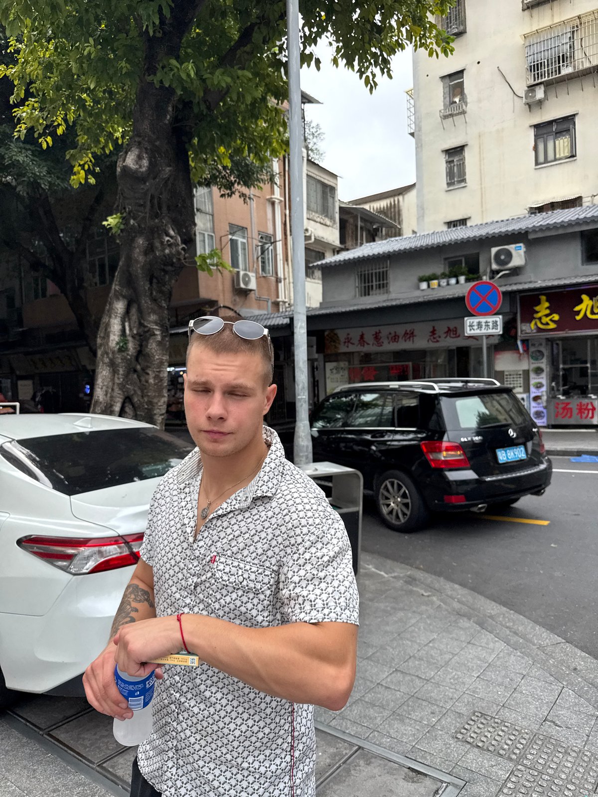 Busy commercial streets of Liwan District, Guangzhou, on a cloudy morning