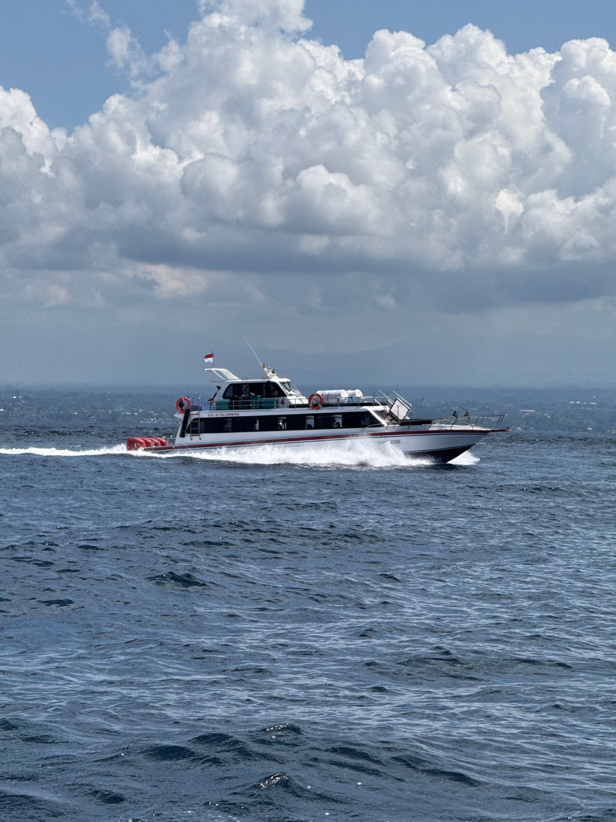 Ferry travels through choppy Indonesian waters early morning