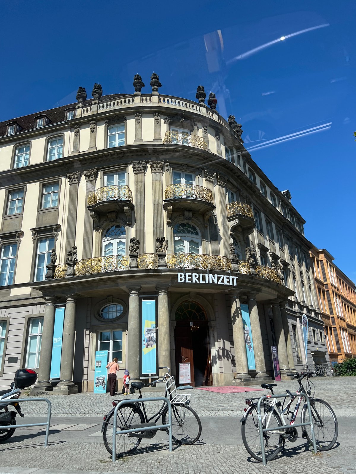 Berlin's Fernsehturm and historic facades on a sunny morning