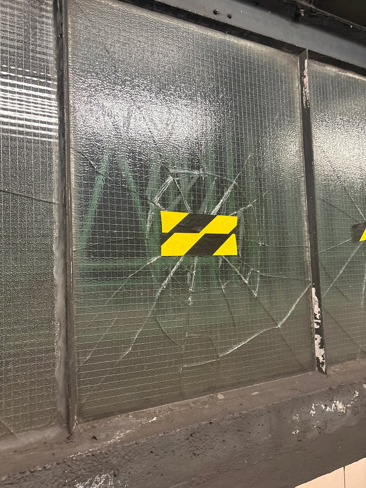 Damaged reinforced glass panel observed in London