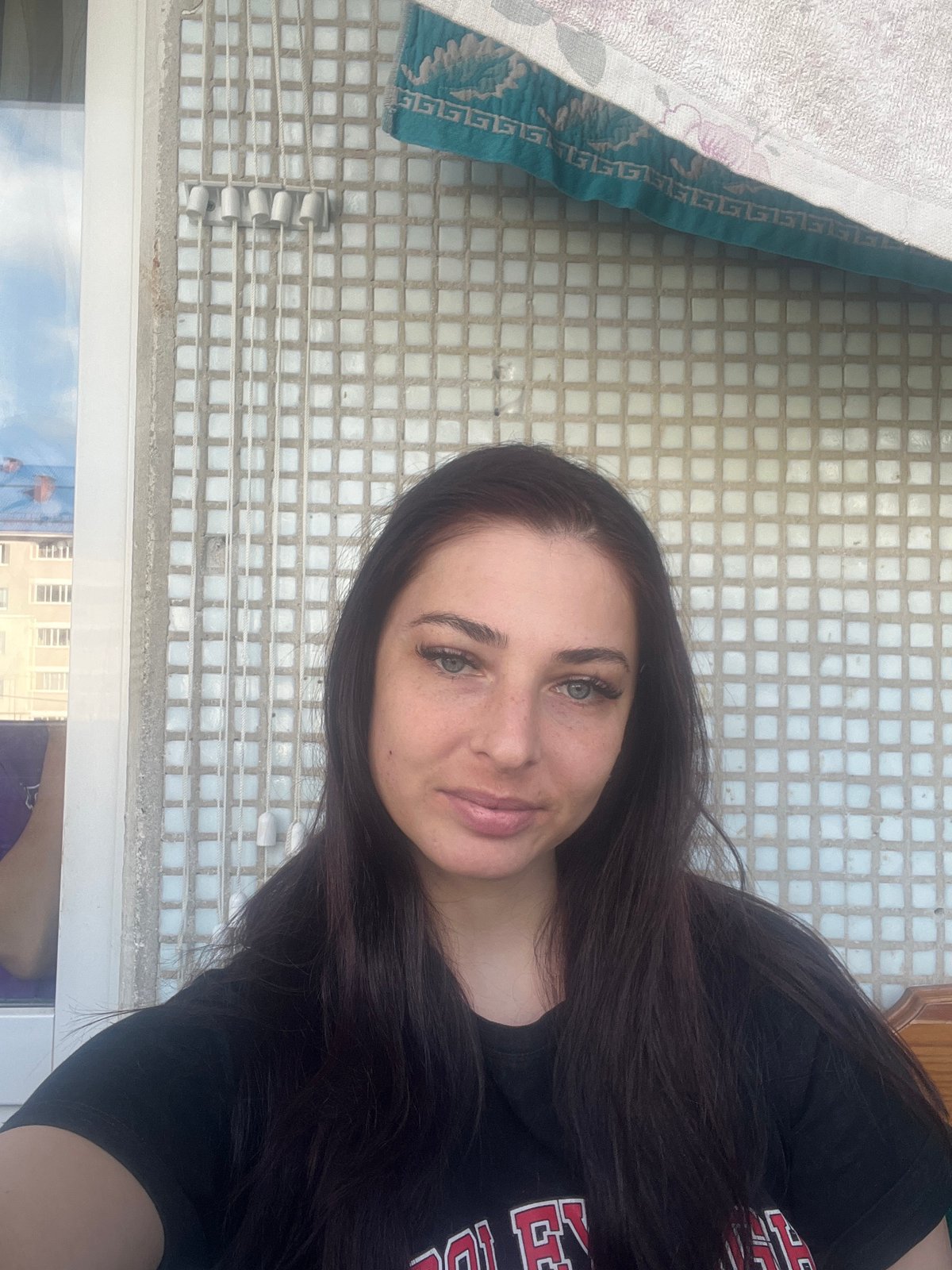 Woman Takes Selfies Indoors in Chaikovsky, Russia
