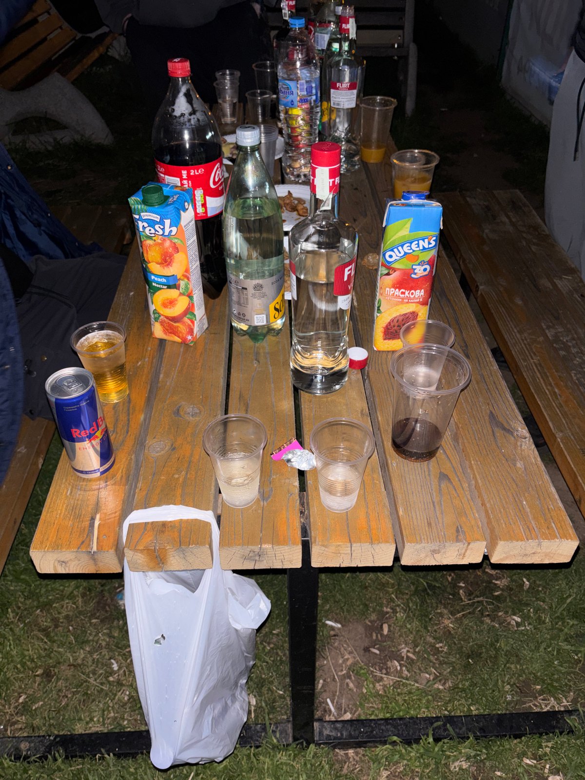 Picnic table littered with empty bottles in Negovan
