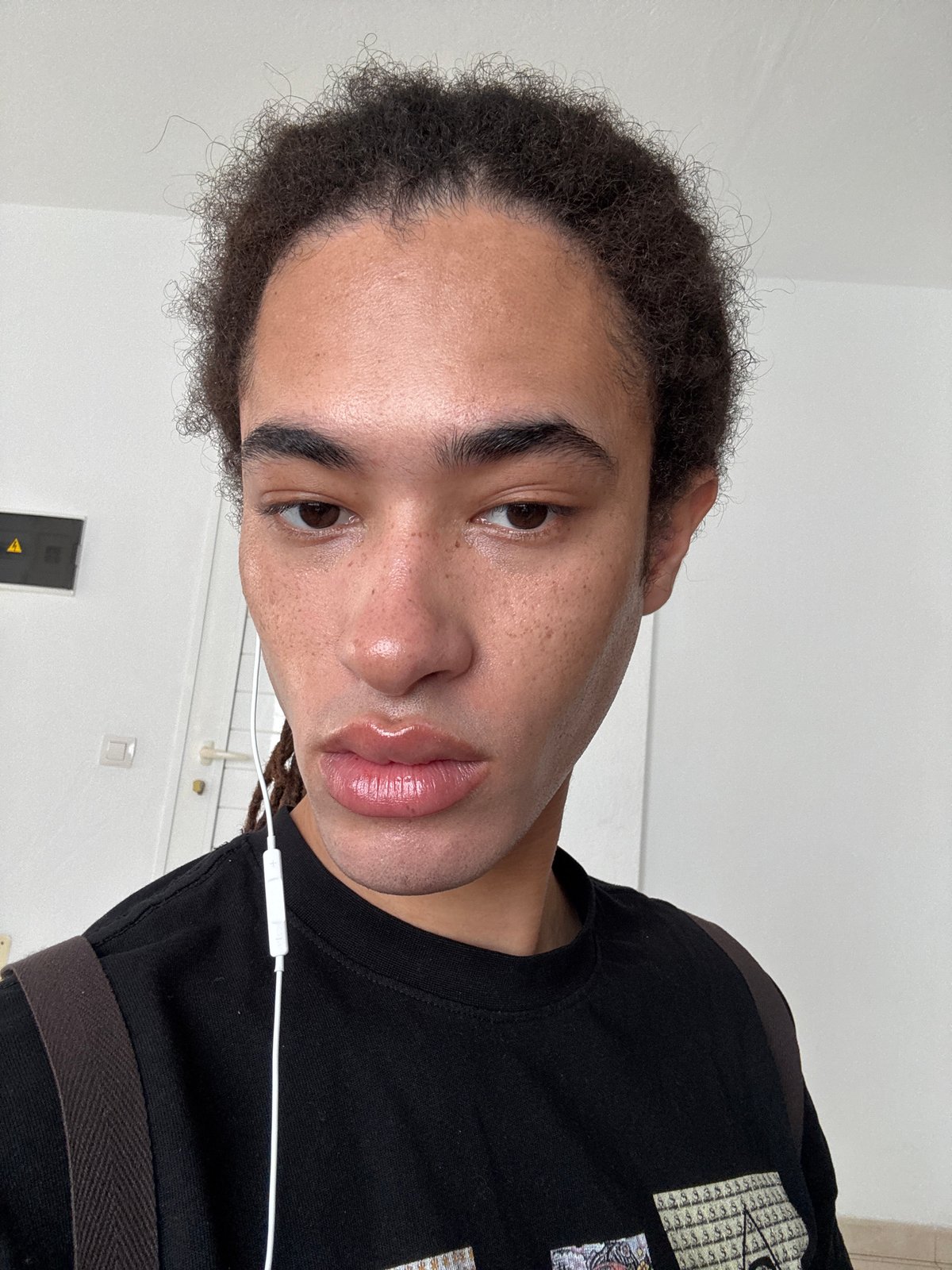 Portrait photograph captured of unidentified person in black shirt