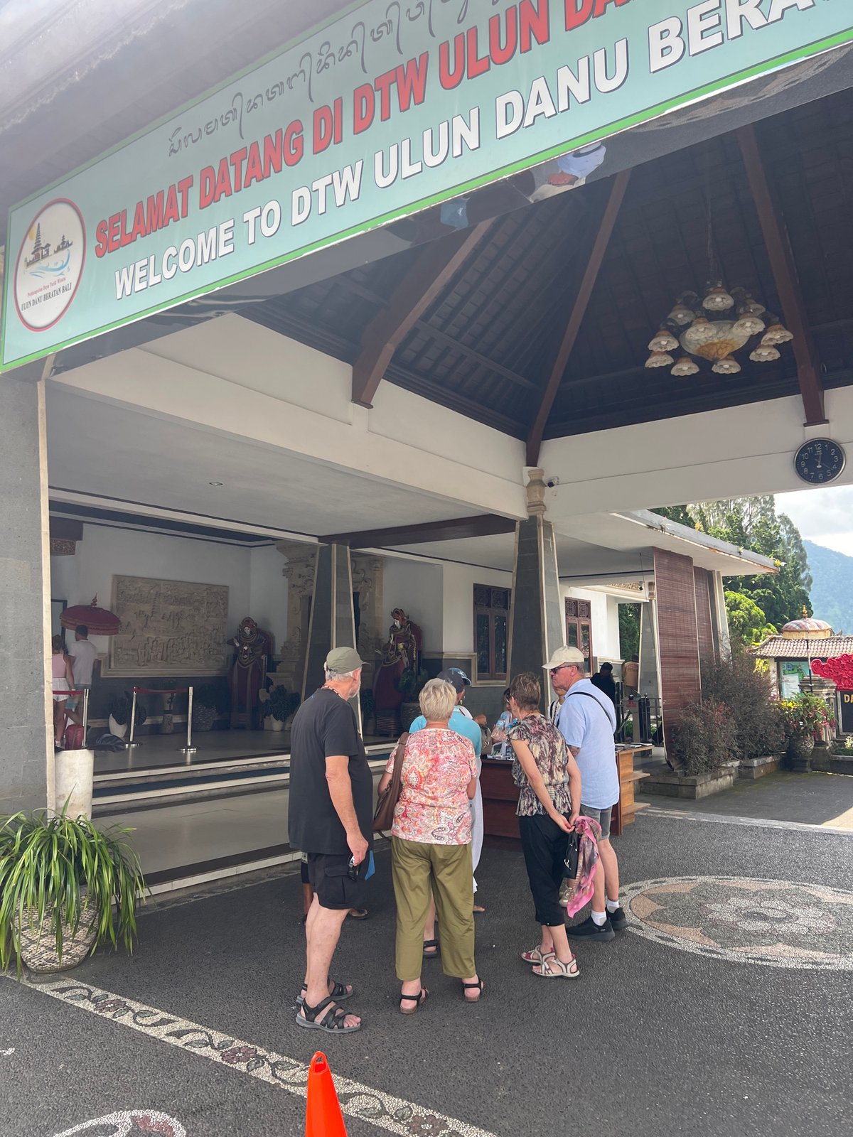 Tourists visit Ulun Danu Beratan temple in Bali