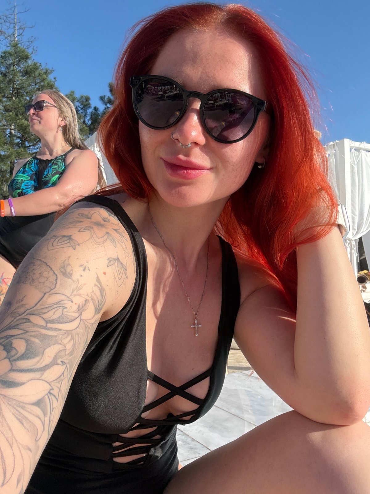 Woman takes selfies at busy Rostov-on-Don pool facility