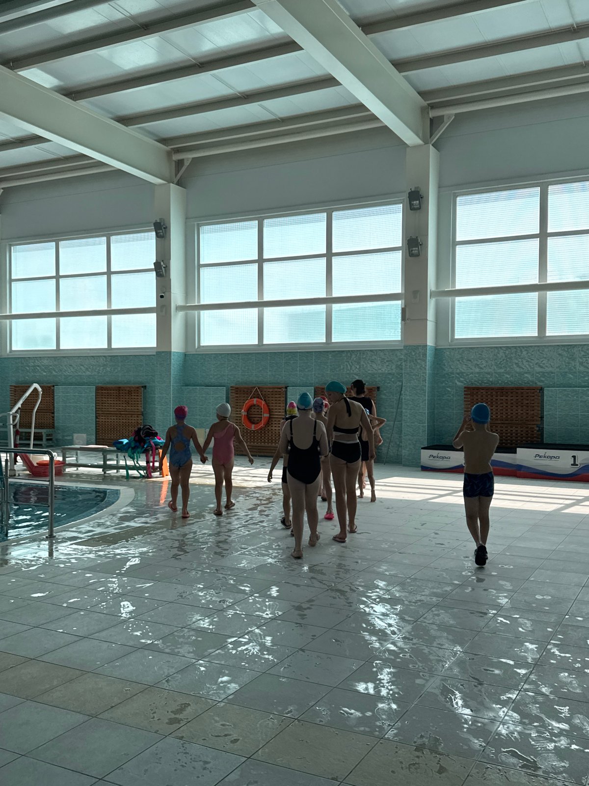 Swim session underway at an indoor pool in Perm