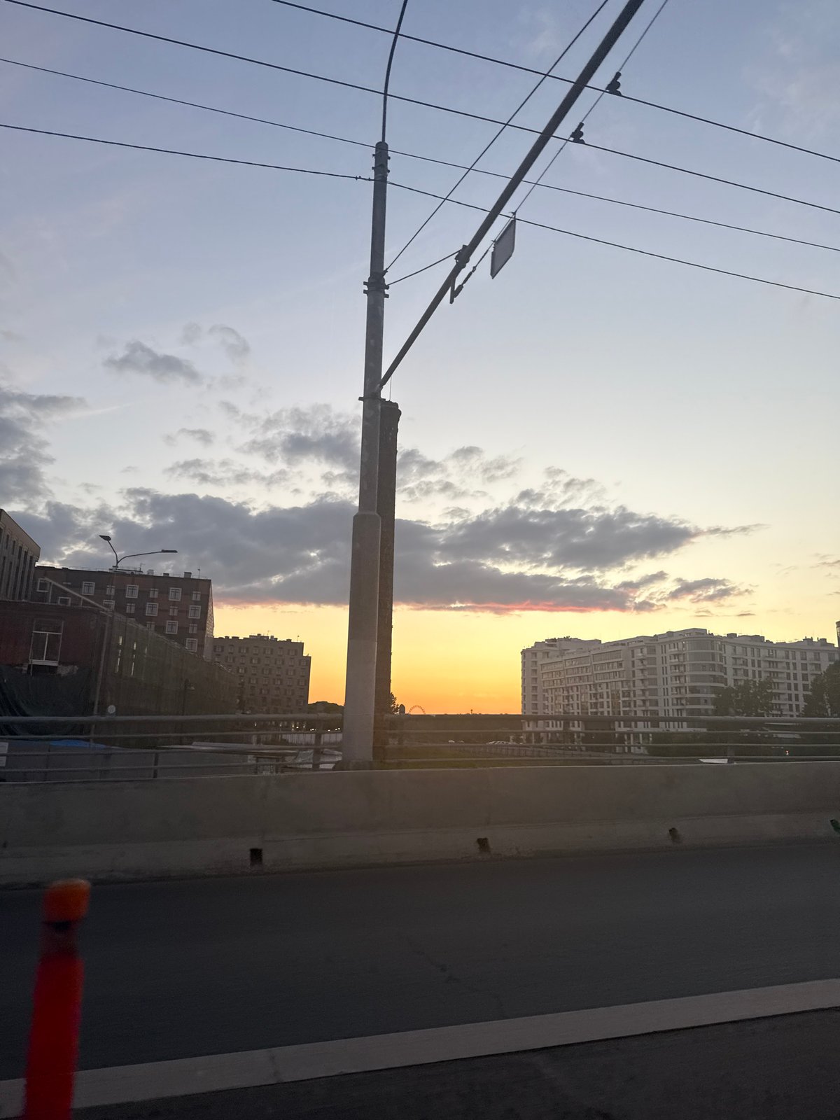 Driving through Saint Petersburg at golden hour past bridges and brick