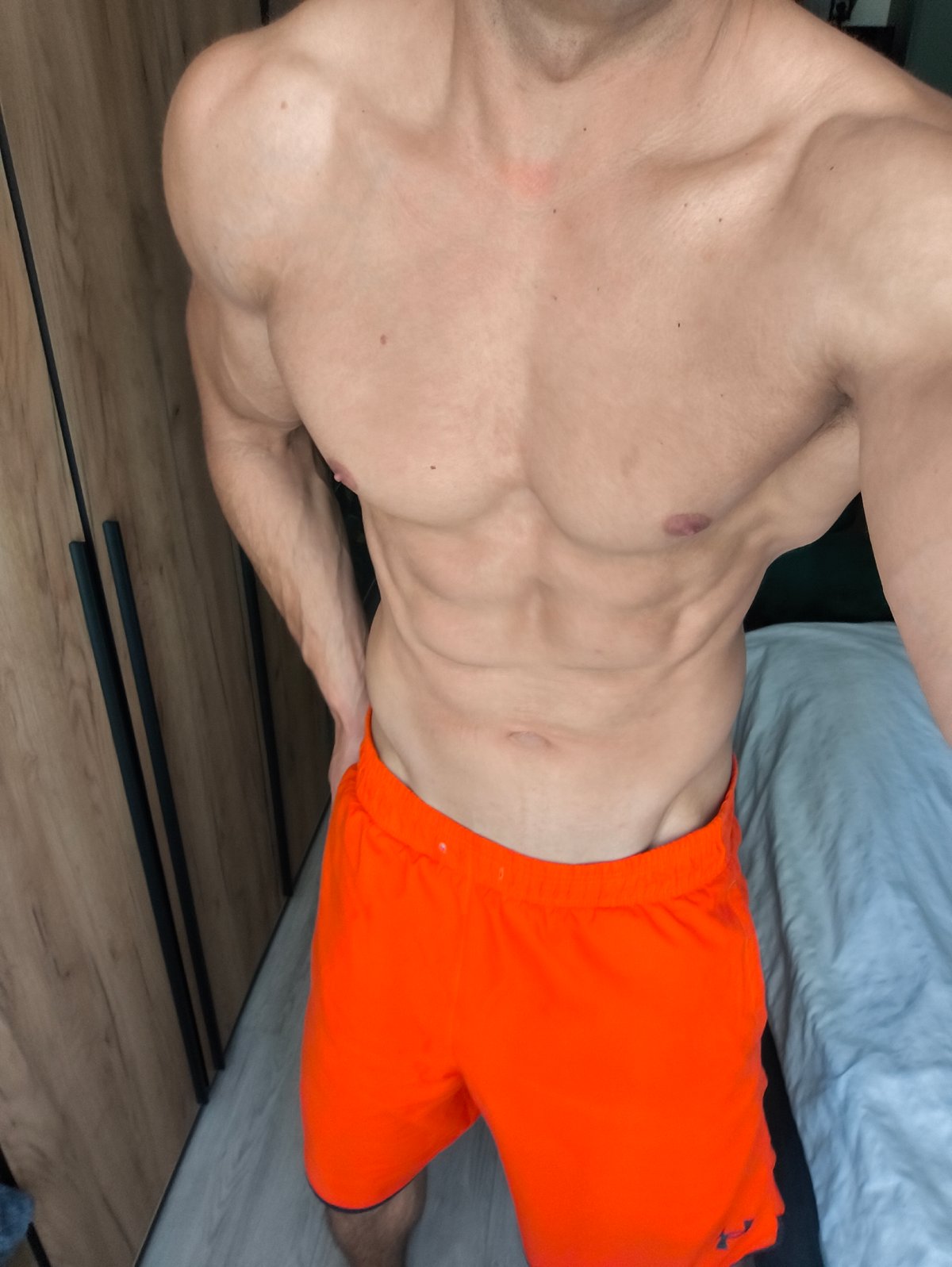 Muscular man observed indoors in Moscow