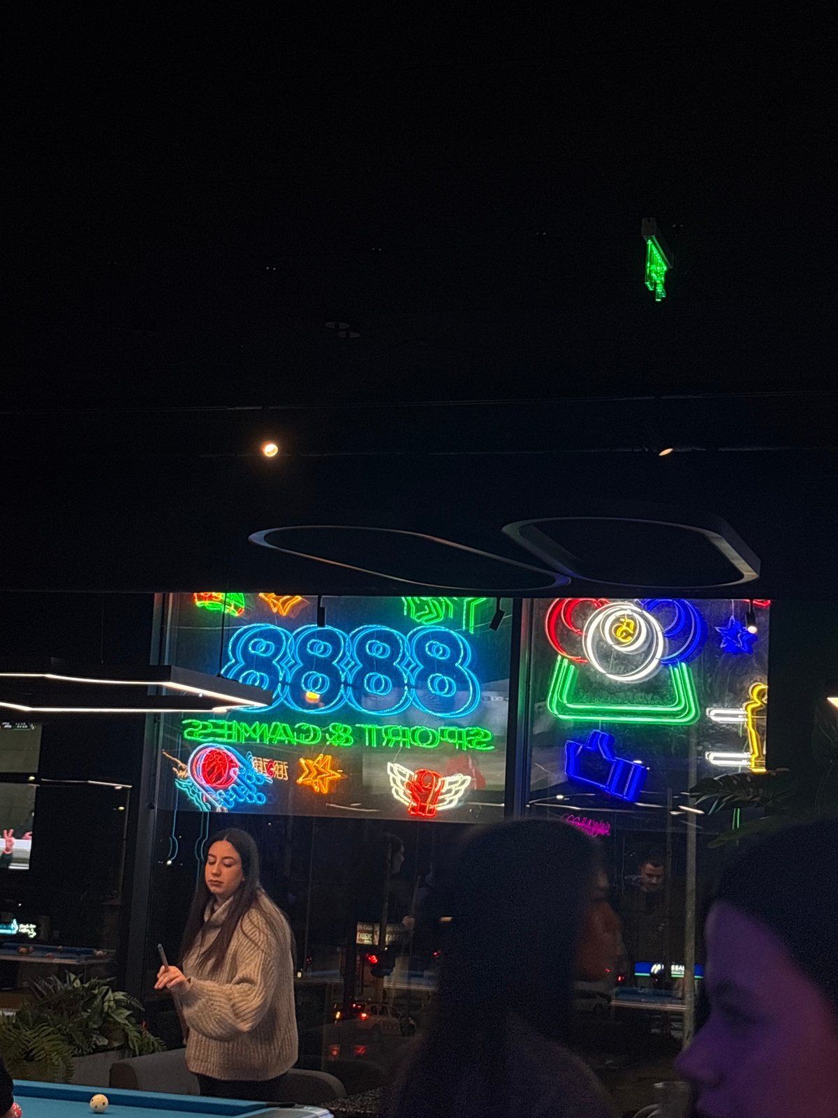 Woman plays pool at Varna nightclub
