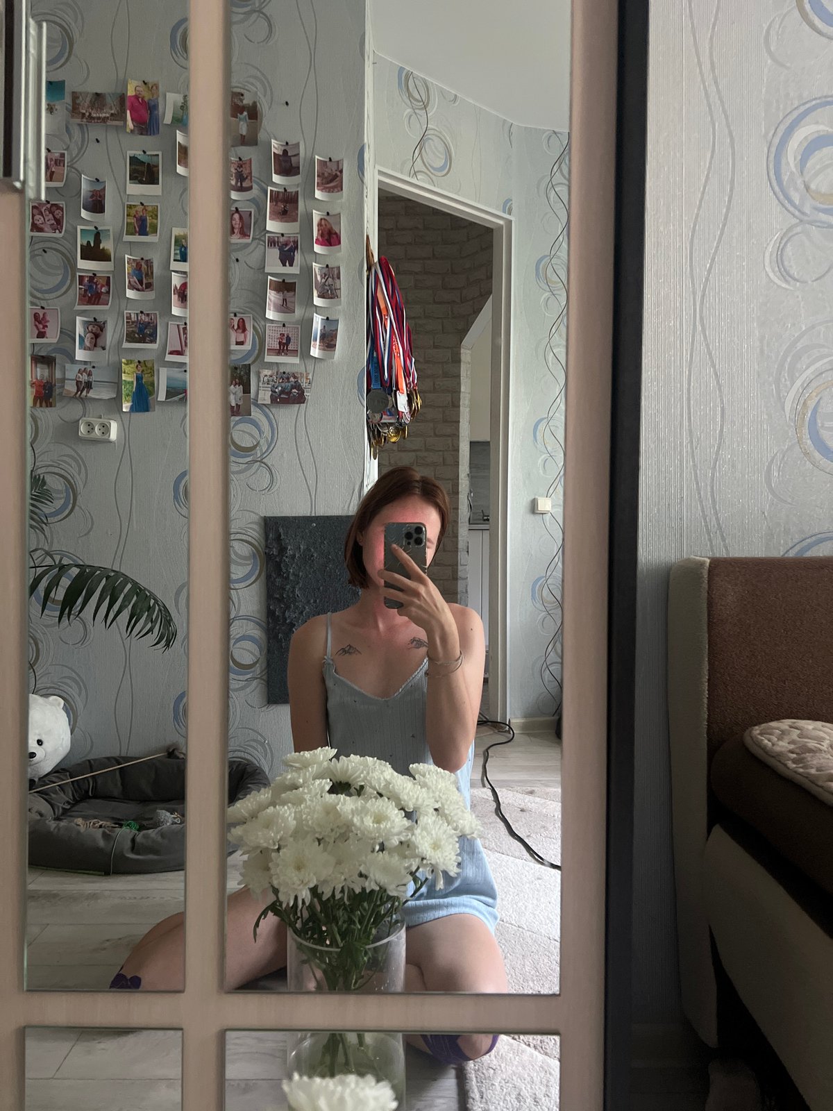 Afternoon at home in Chaikovsky, with flowers, a cat, and a church nearby