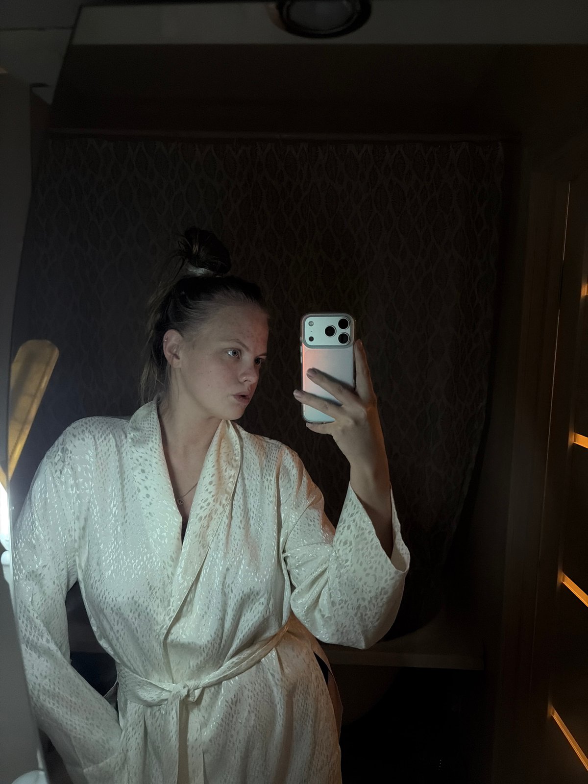 Woman practices acrobatics and yoga poses in Izhevsk bedroom
