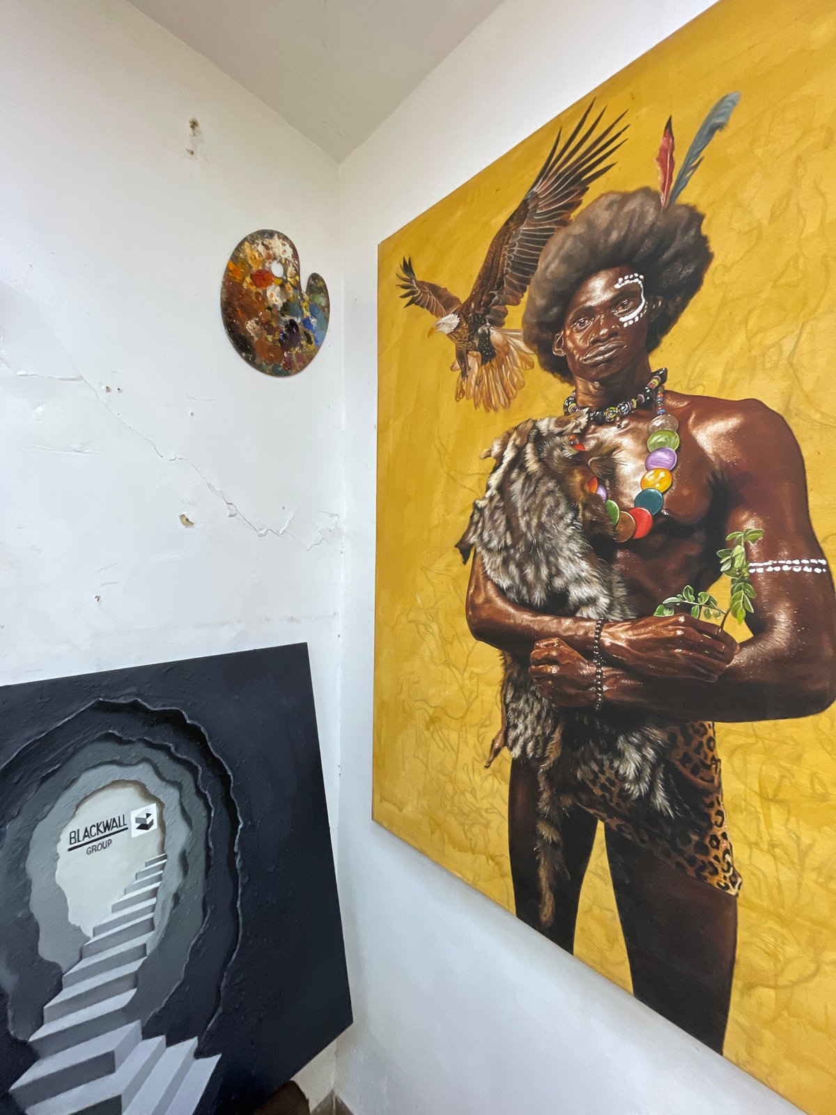 Inside an Ado art studio amid large works in progress